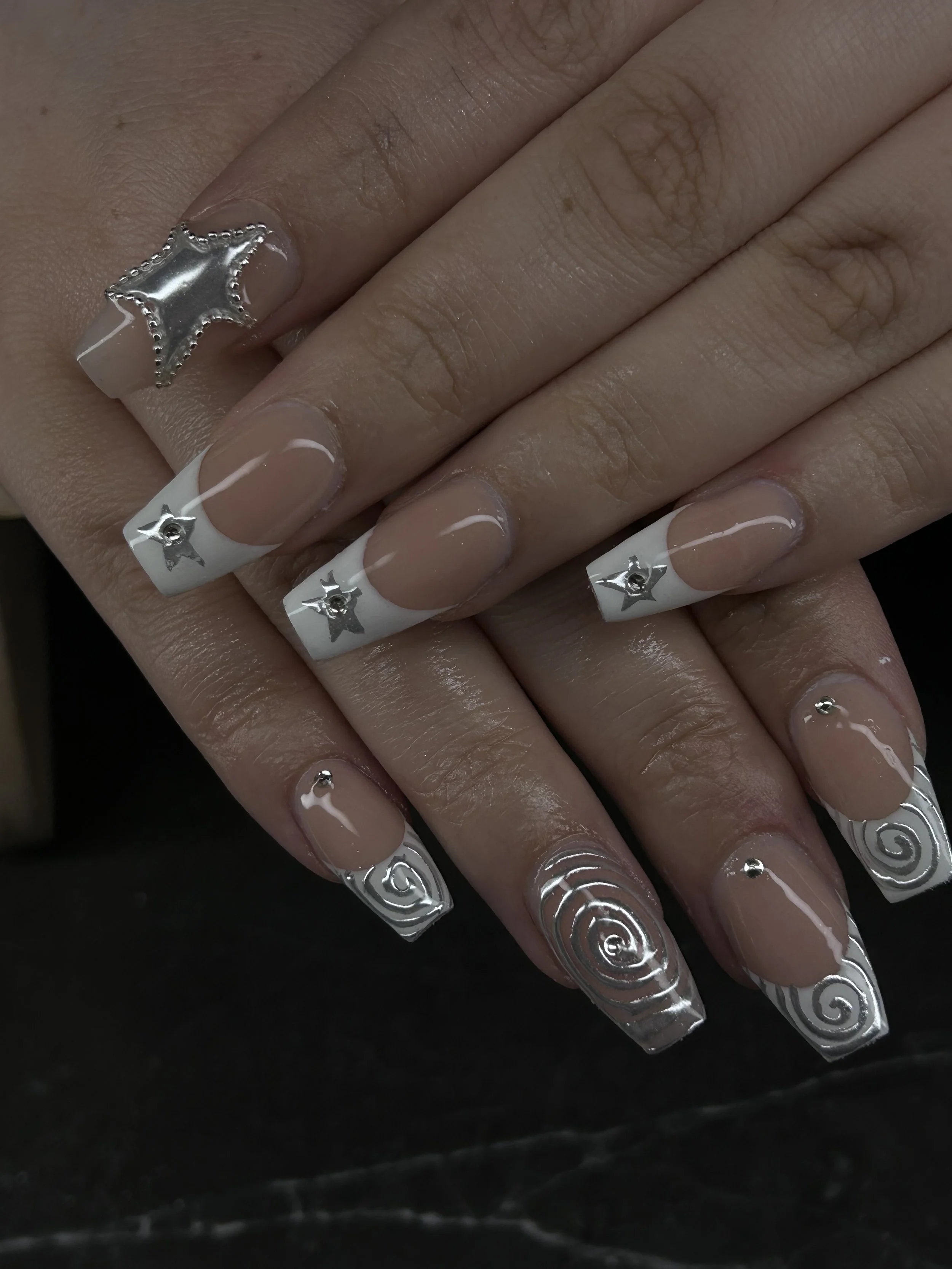 White french tips with silver chrome stars and spirals London Ontario