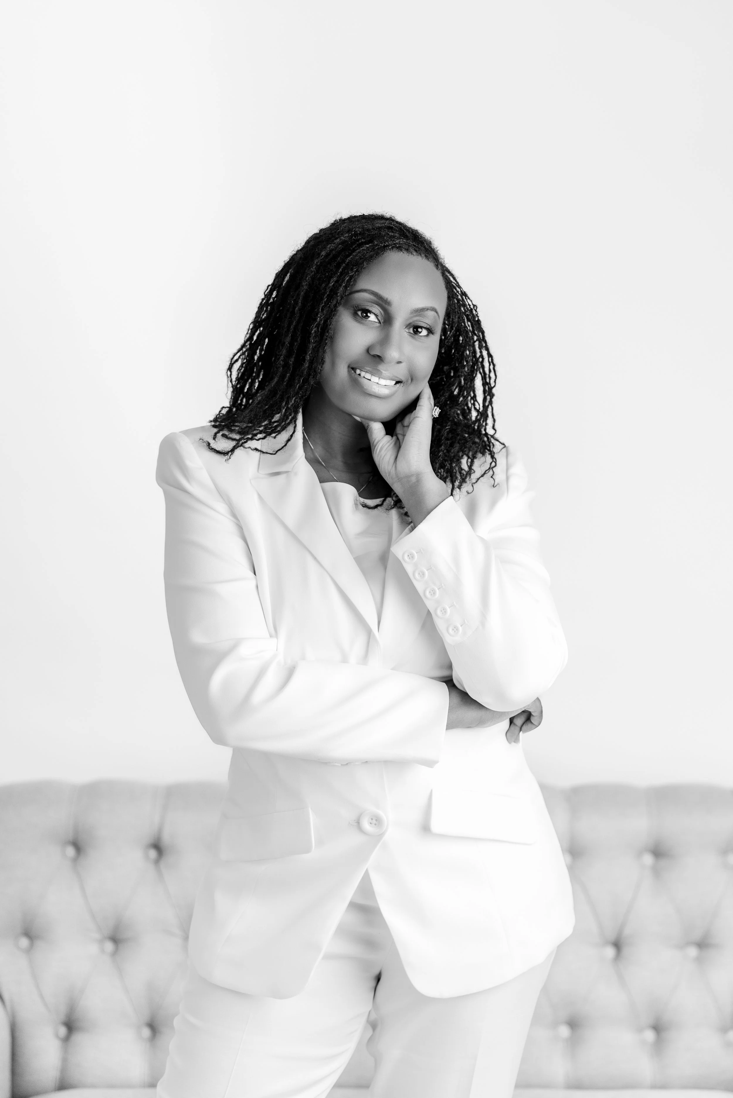 Black and white portrait of a woman named Raven Mitchell who is the Owner of Ro Wellness in Florence, SC