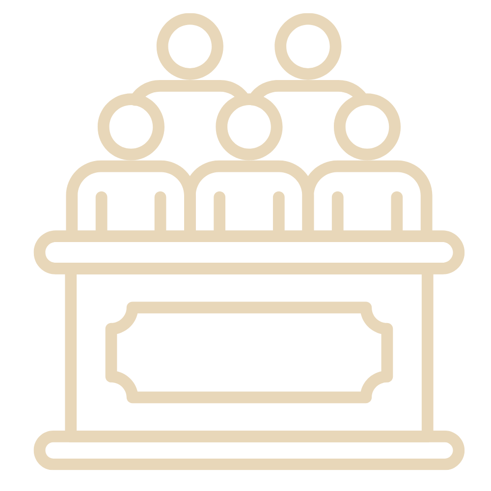 Outline icon of three people sitting behind a desk or table with a nameplate or label in front.