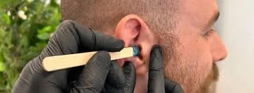 Ear waxing