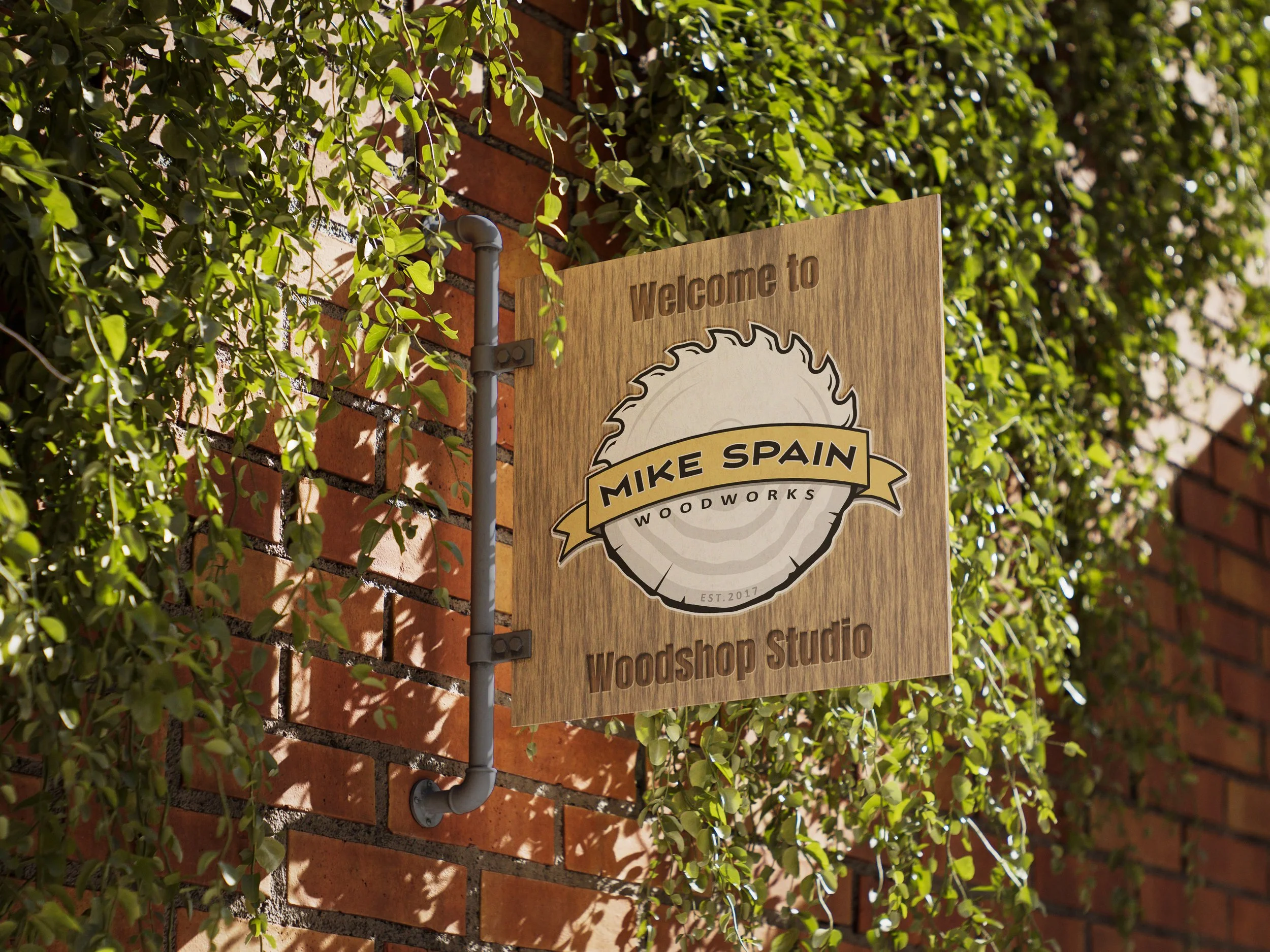 Wooden engraved signboard on exterior brick wall