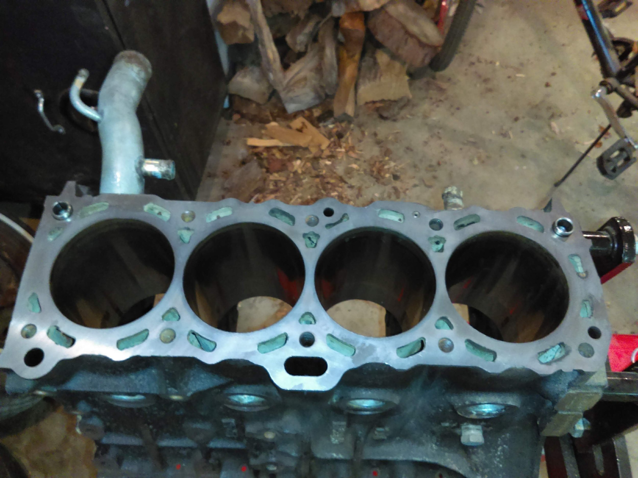 Close-up of a stripped Nissan CA20E engine block.