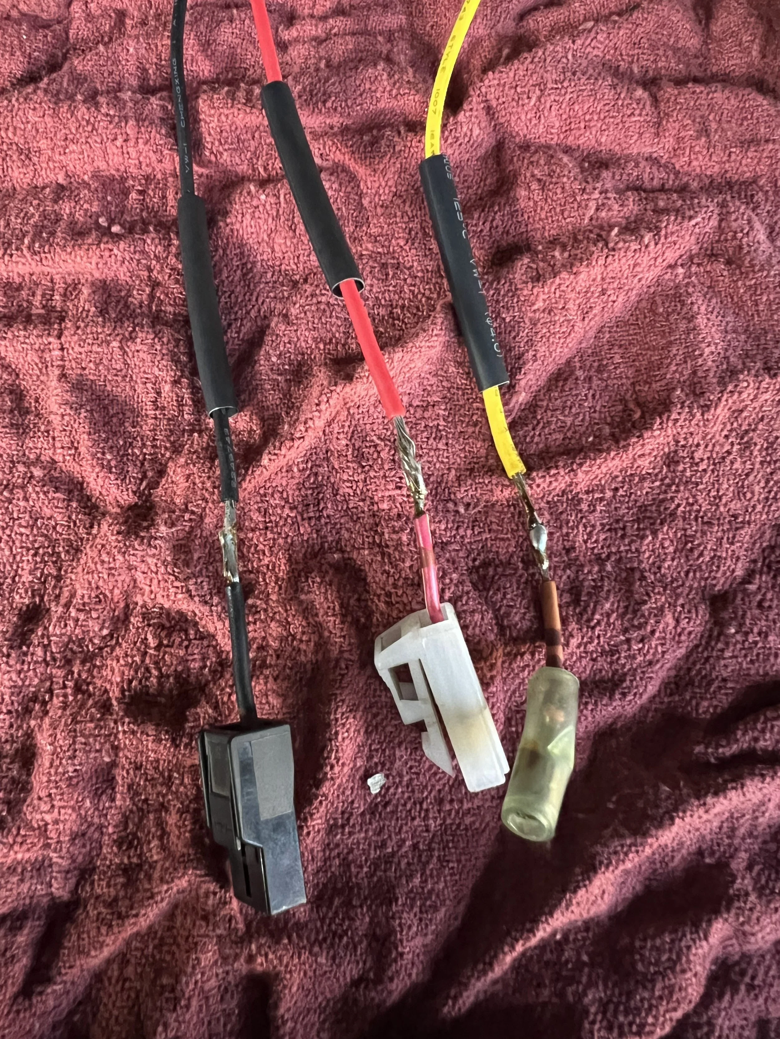 Three circuits properly soldered and ready to be heatshrinked.