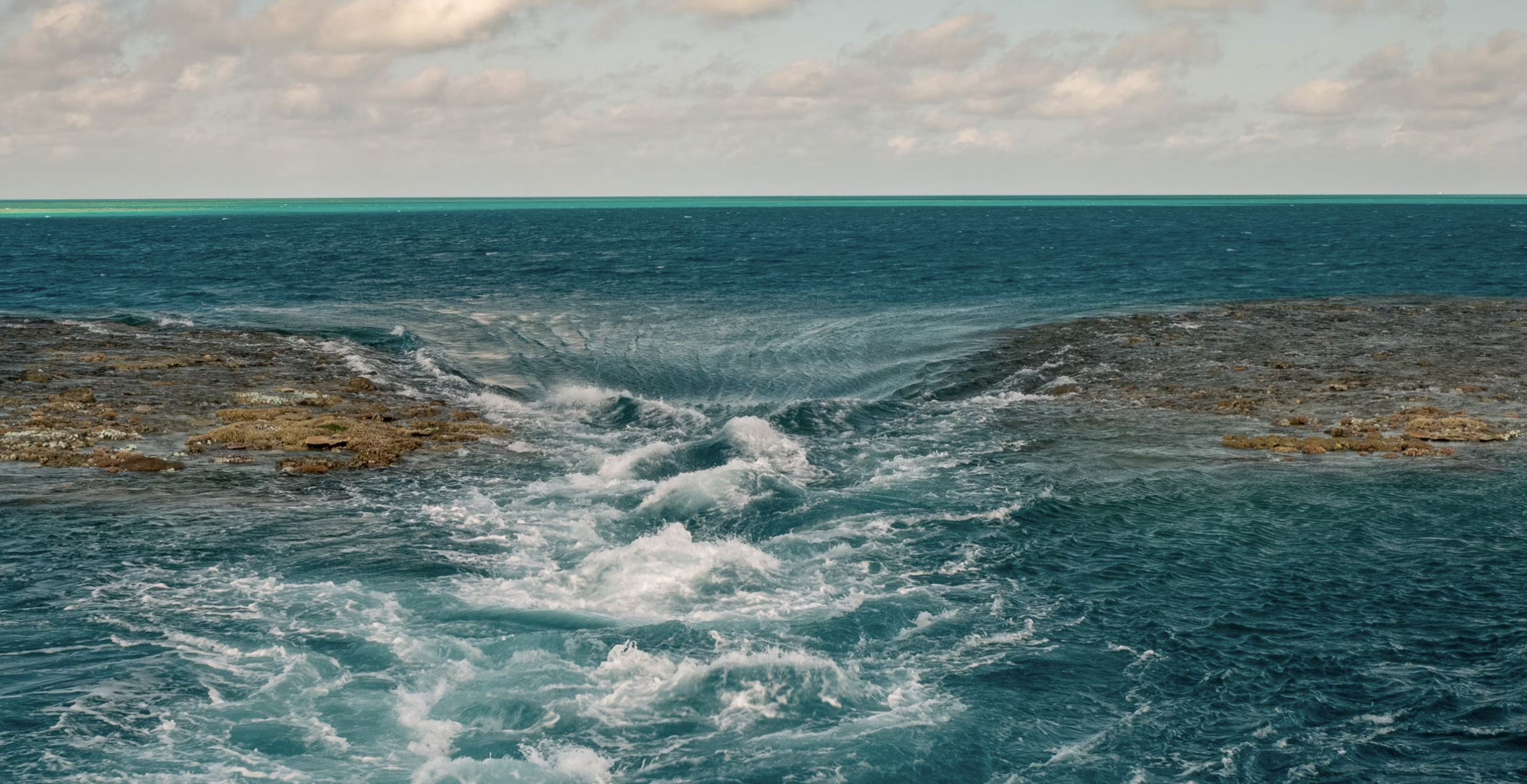 Powerful tidal currents rushing over a reef along the remote Kimberley coast of Western Australia.