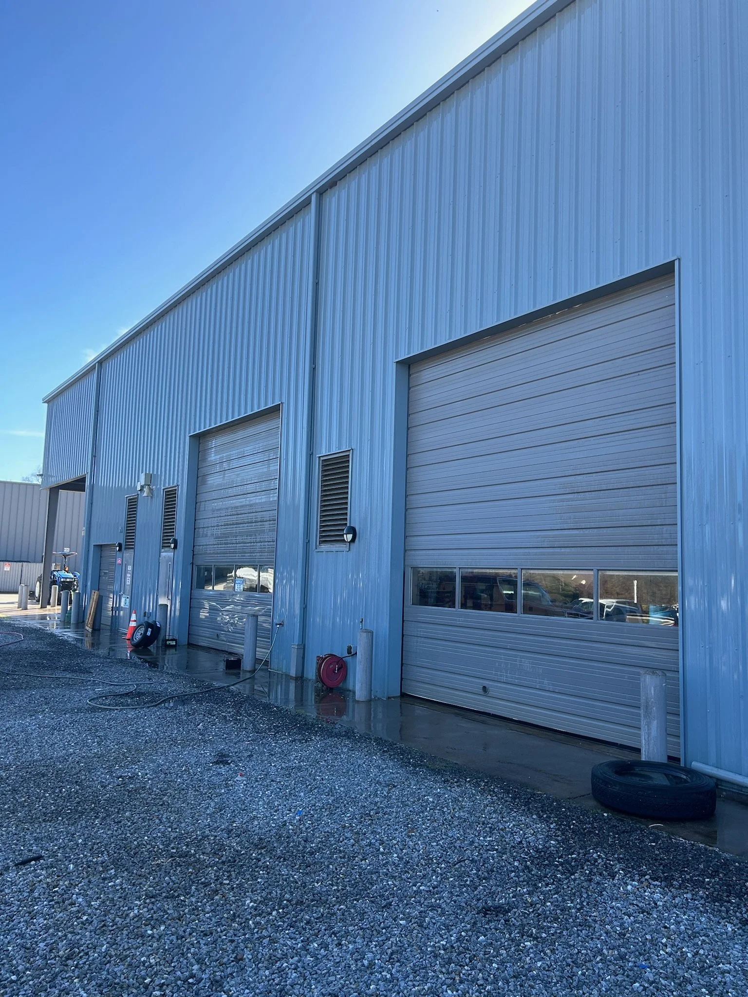 metal building that has just been cleaned clean metal building clean power washing building 