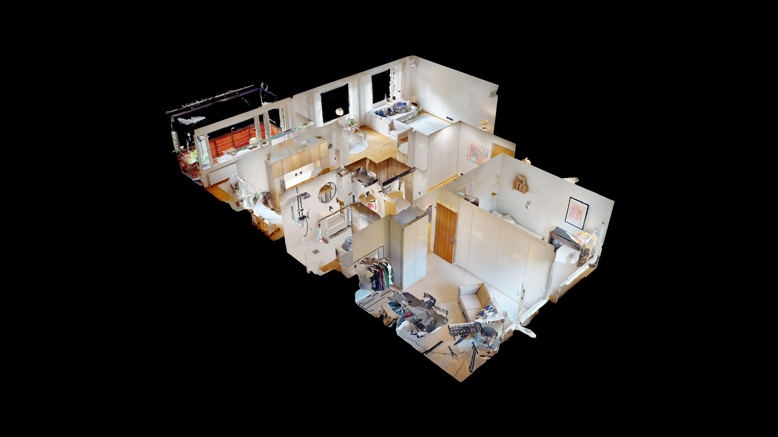 3D floor plan of a multi-room house showing living room, bathroom, bedroom, and kitchen with furniture and appliances.