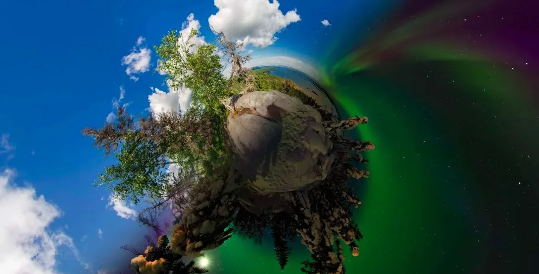 Tiny planet effect landscape with trees, blue sky, clouds, and northern lights.
