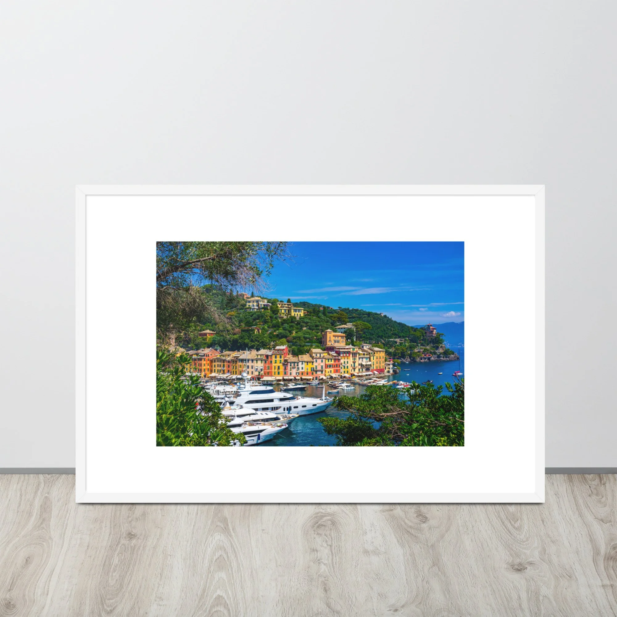 Classic view of Portofino harbour, with colourful waterfront buildings and Mediterranean scenery.