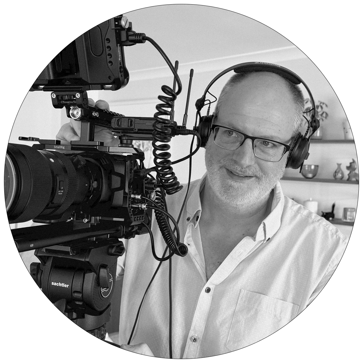 Filmmaker Keith Wright operating a camera while making the Surviving Tinnitus documentary