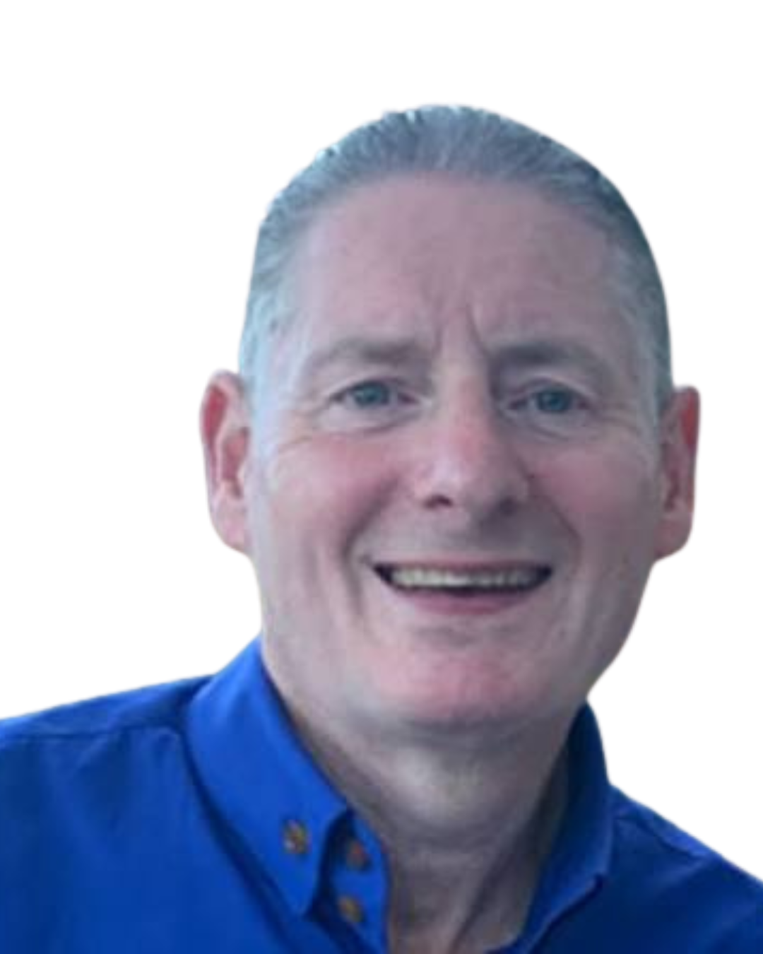 A smiling man with short, slicked-back gray hair, wearing a blue collared shirt, against a plain white background.