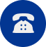 Icon of a traditional telephone in white on a blue circular background.