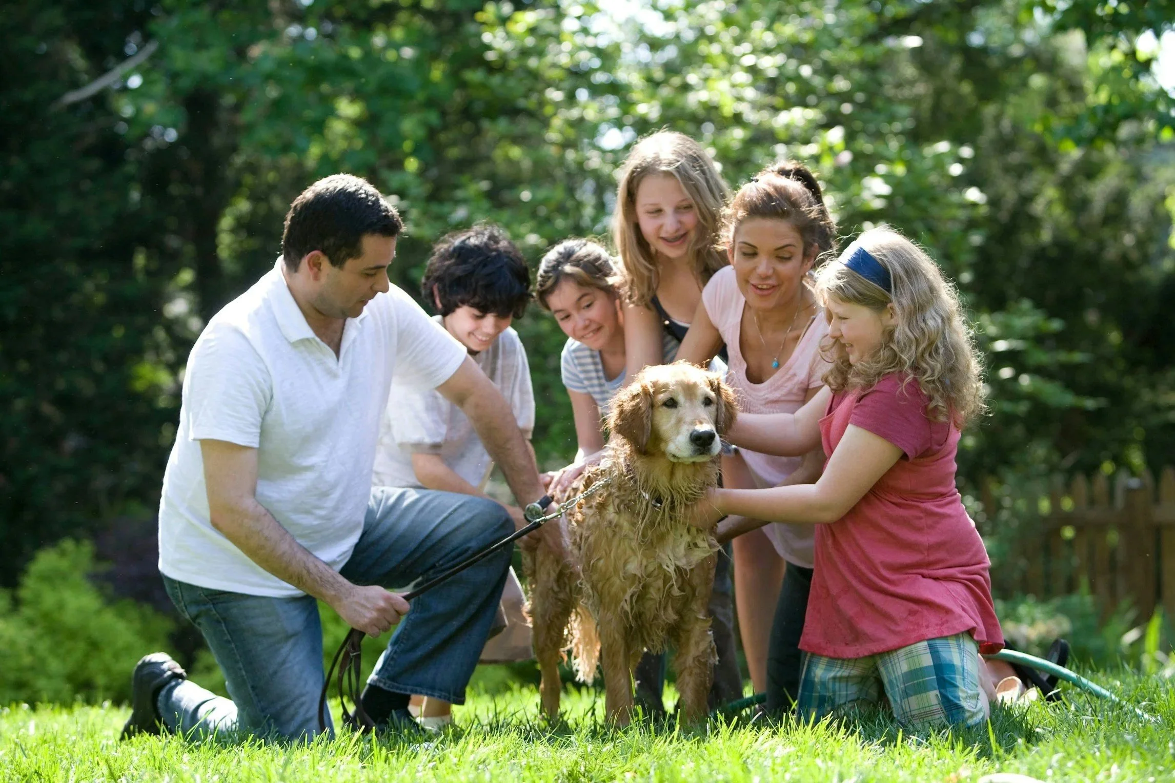 Family enjoying healthy smiles at Scarsdale Family Dental Care