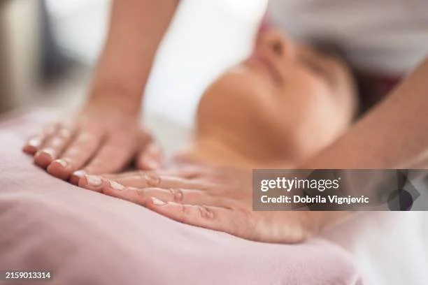 Person receiving a massage on their back.