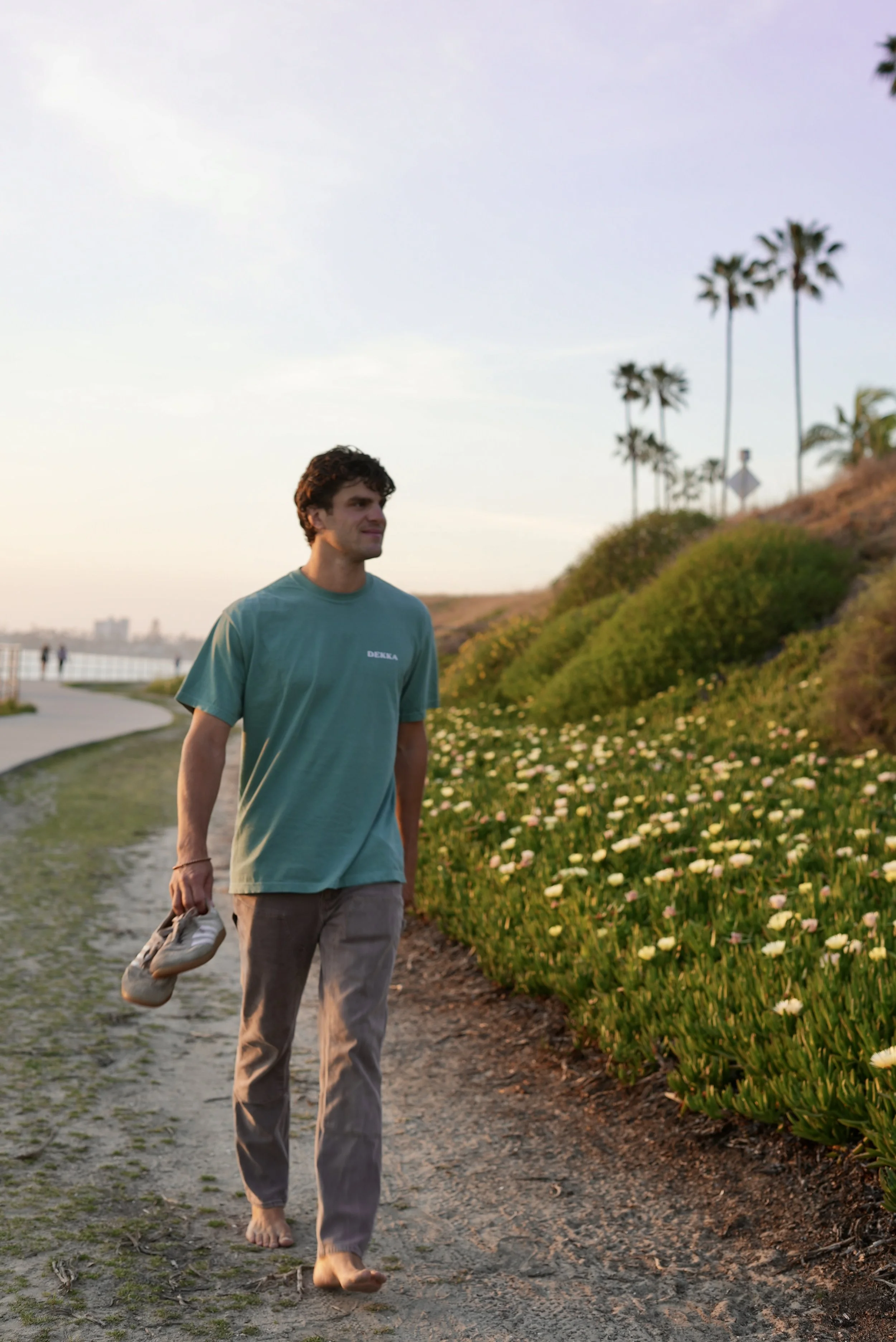 Coaching conversation while walking on a coastal path in San Diego