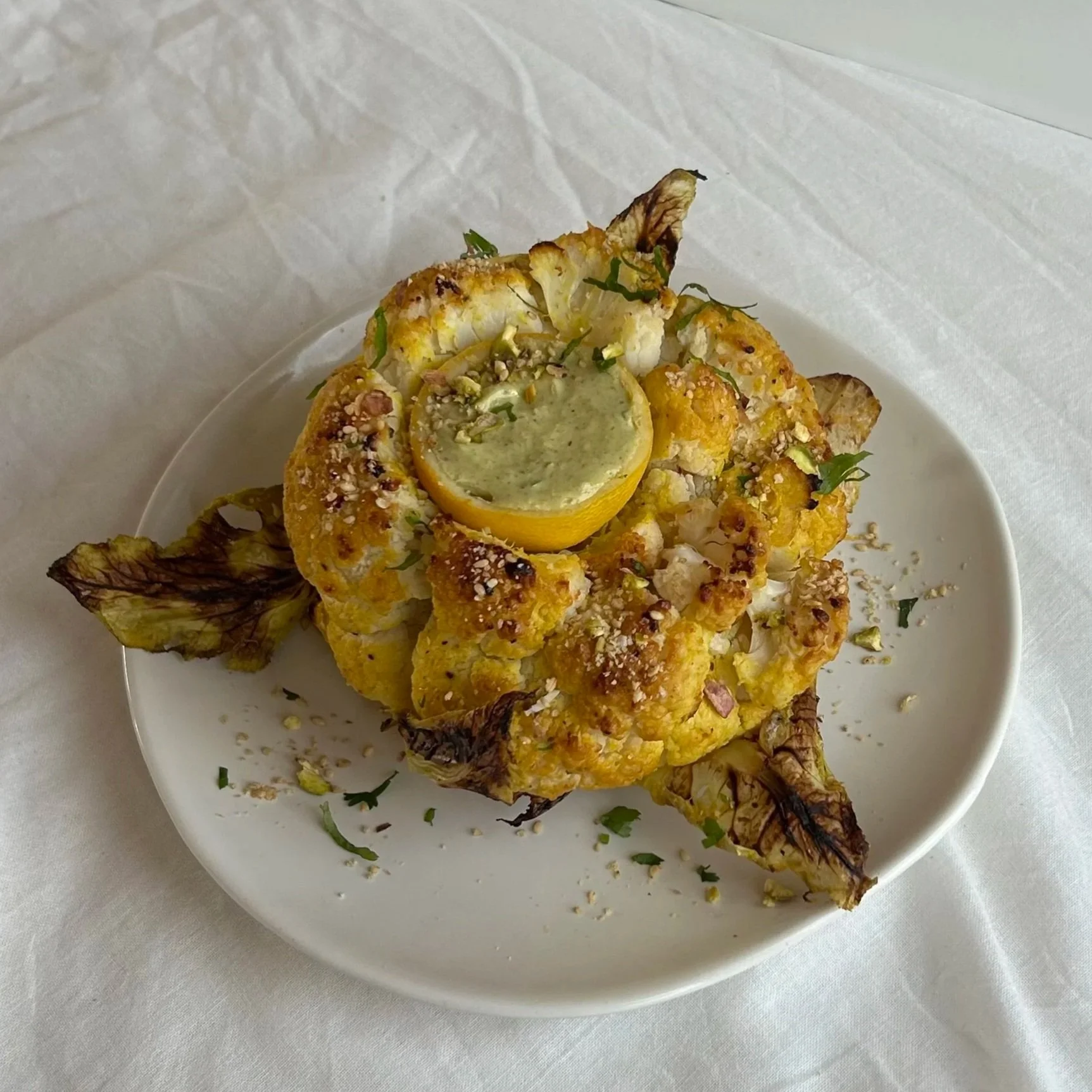 Golden citrus roasted cauliflower &amp; herby pistachio tahini sauce