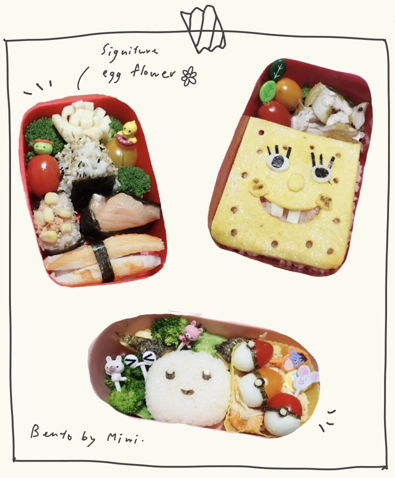 Three bento boxes with character-themed food: one with assorted sushi and vegetables, one with an omelette shaped like SpongeBob SquarePants, and one with rice shaped like a cute animal face surrounded by broccoli and small decorative food items.