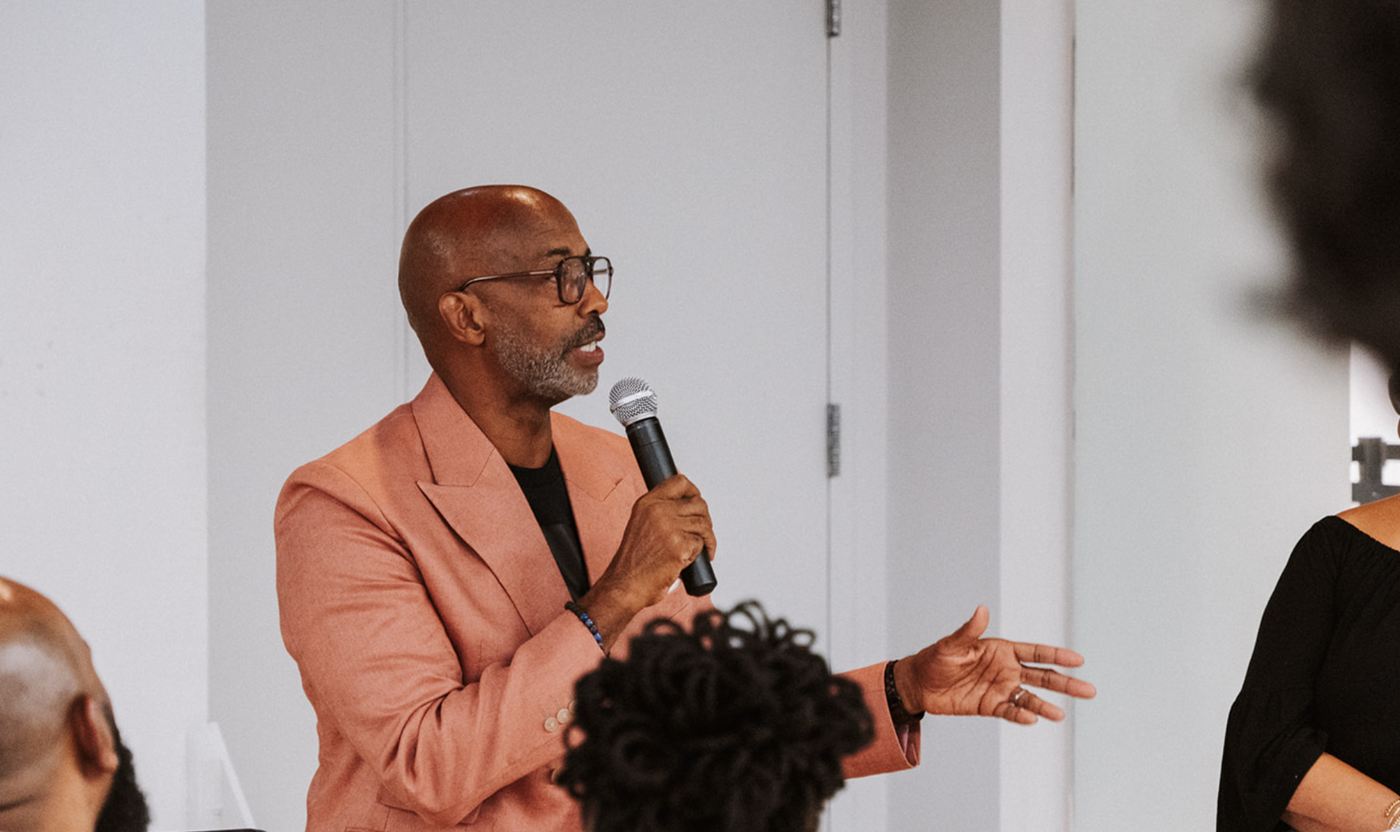 Dwayne E. Brown speaking during a Brownstract Art Studio event.