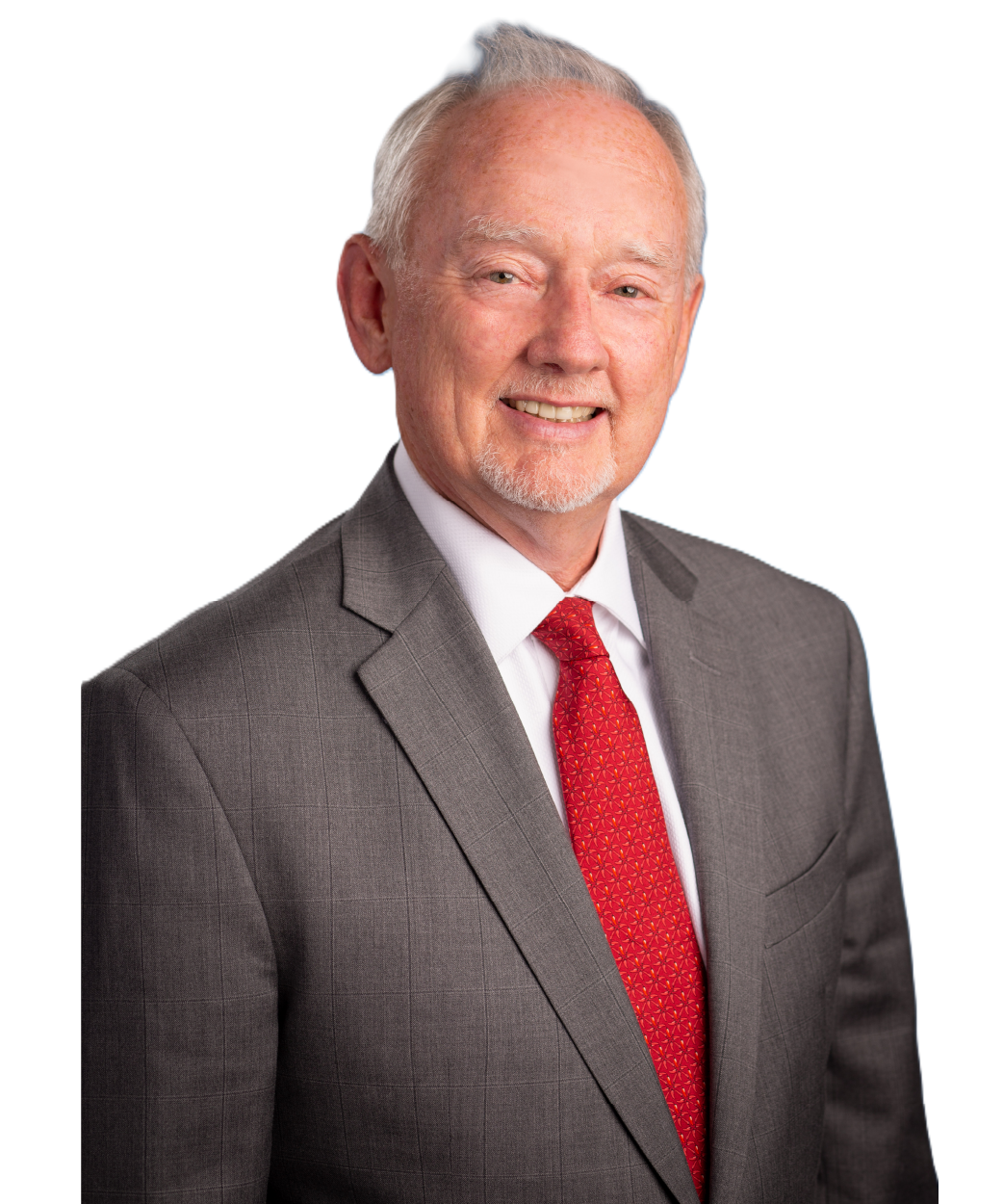 George Bray for McCracken County Judge Executive Kentucky wearing a gray suit, white shirt, and red tie, smiling at the camera.