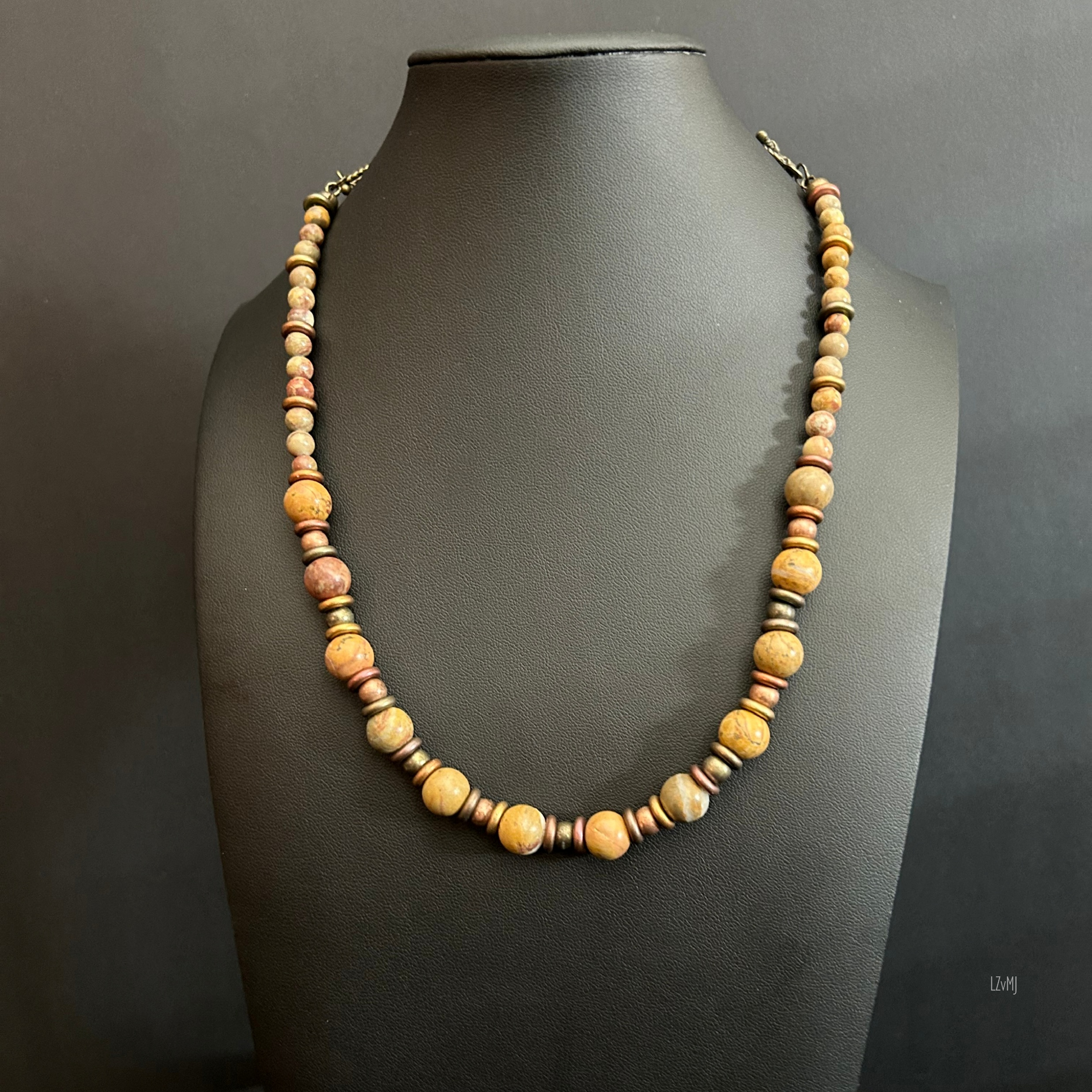 “Jasper necklace on bust with matching 5‑inch extender shown beside it.”