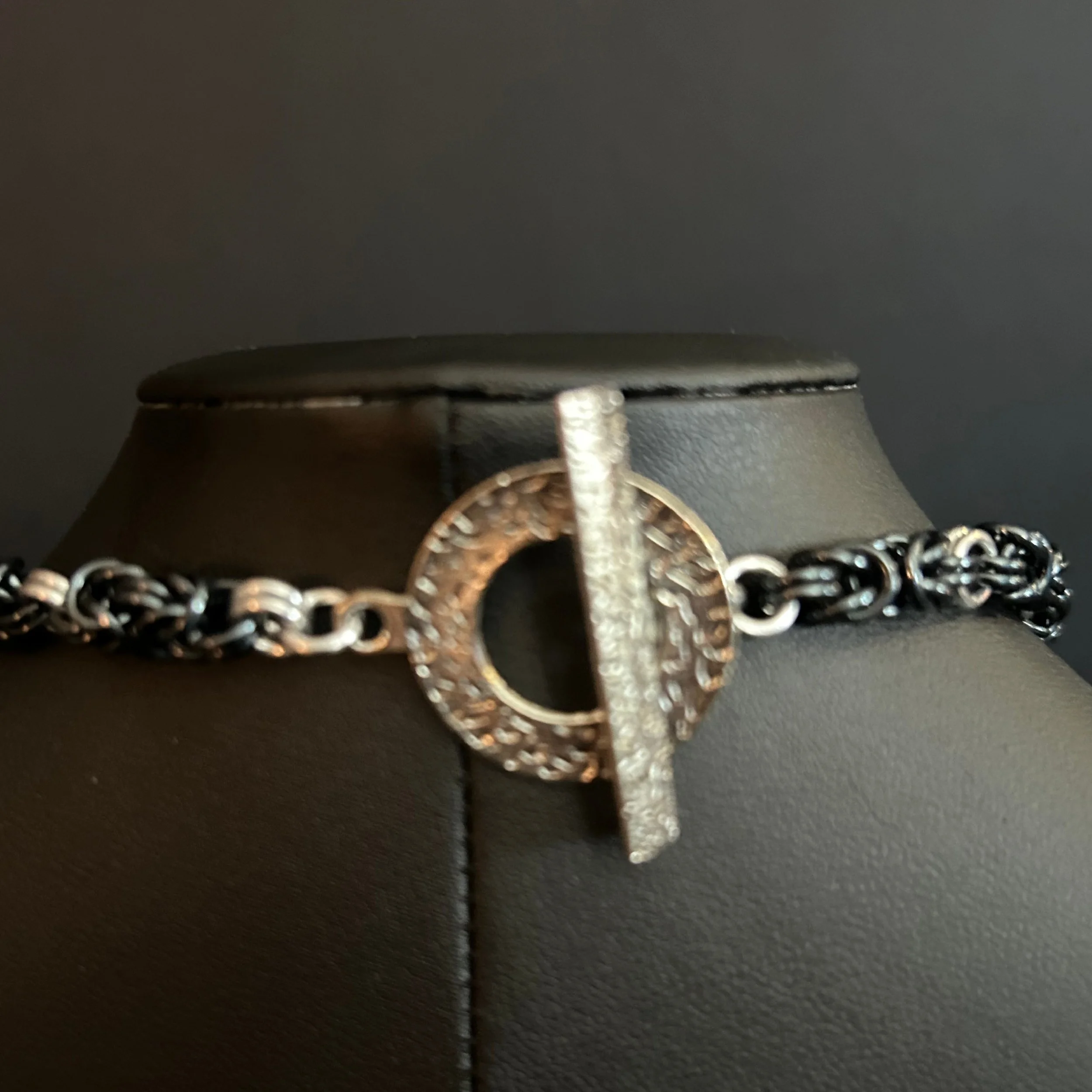 1982_clasp_sq.JPG