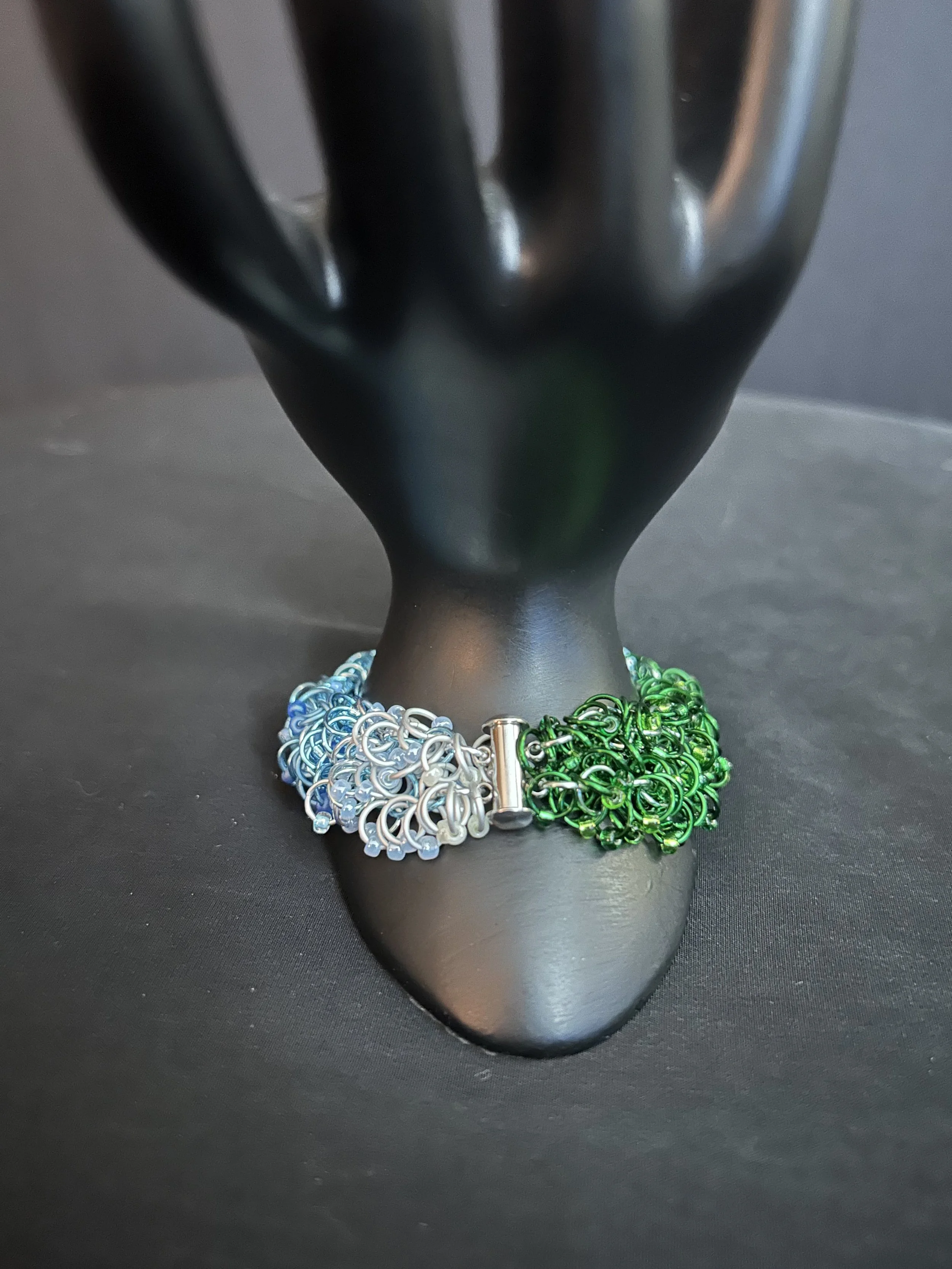 “Stainless steel slide‑lock clasp on the Blue Ridge Mountain Bracelet with aluminum rings and gradient colors.”