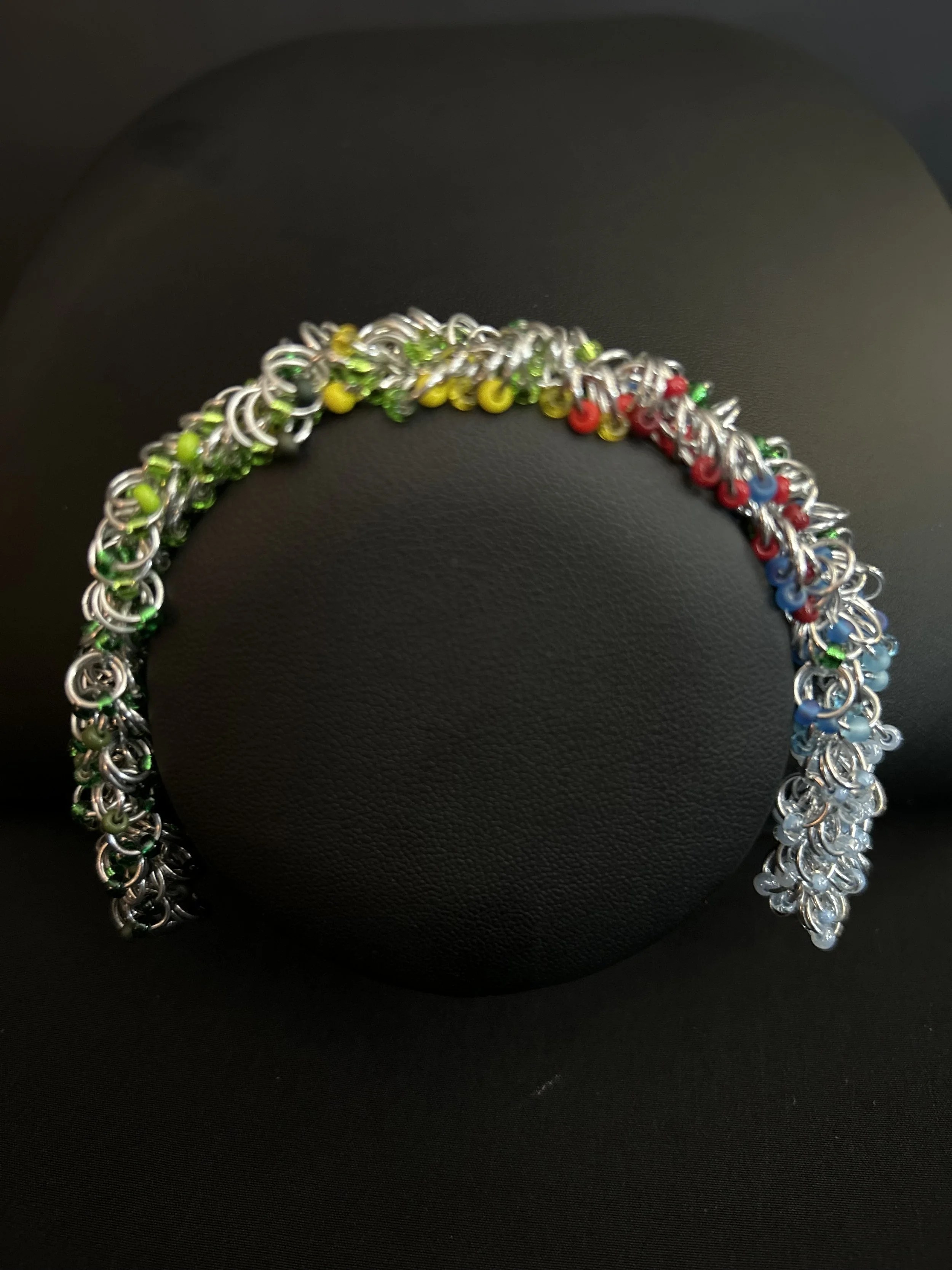Blue Ridge Summer Bracelet shown on a black jewelry bust to display scale and drape.