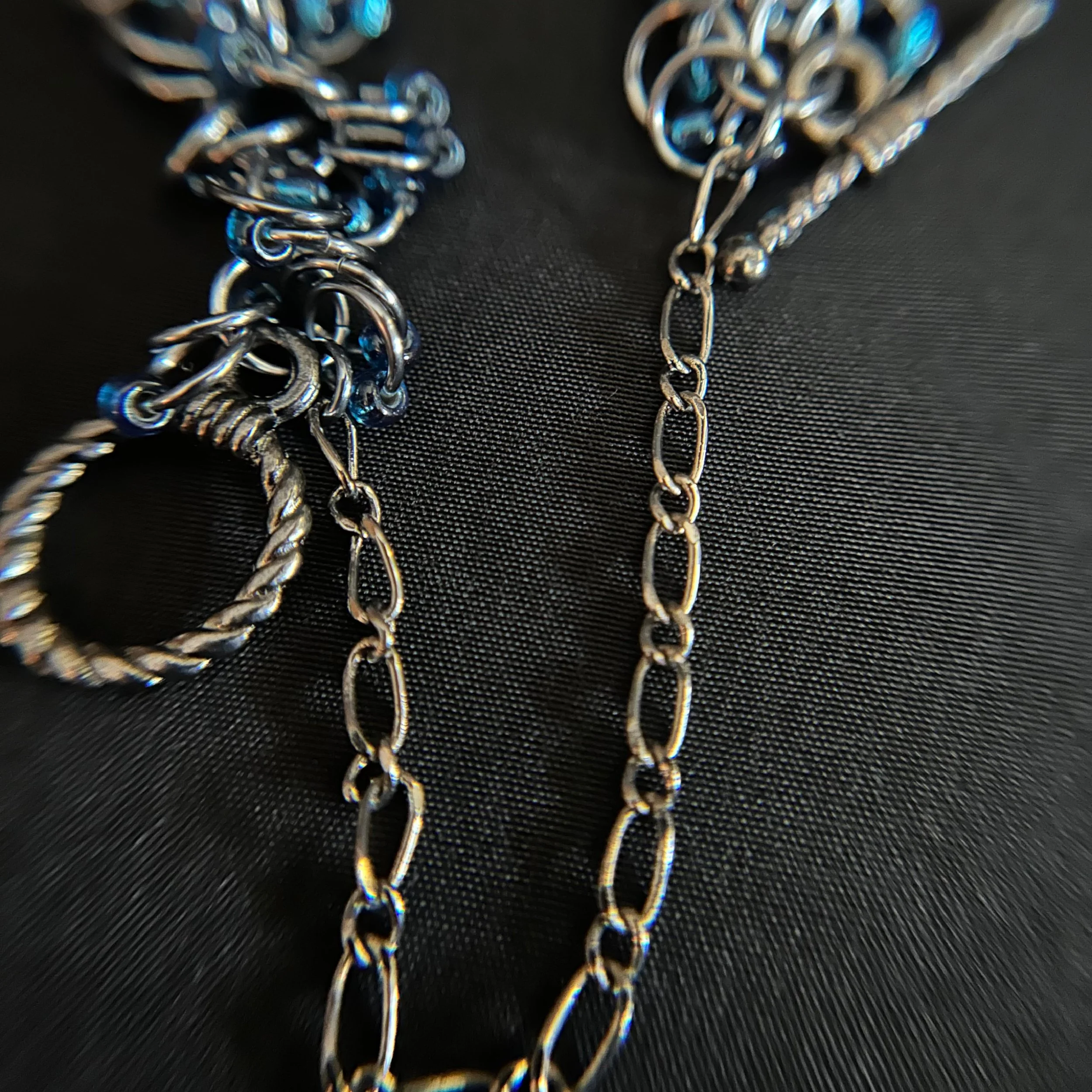“Close-up of the gunmetal toggle clasp and connecting rings.”