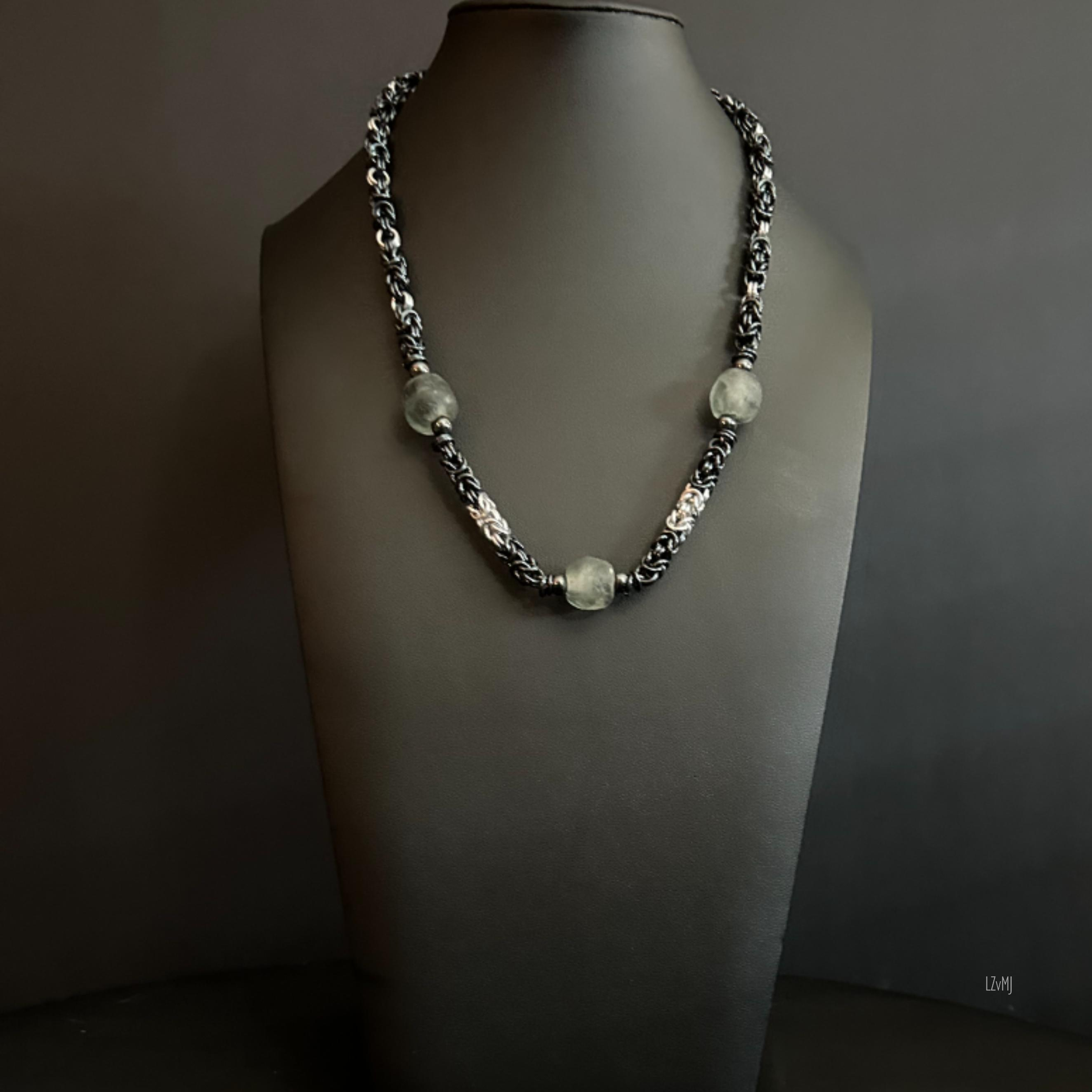 “Full view of the Black Ice and silver chain necklace with three slate‑gray beads.”