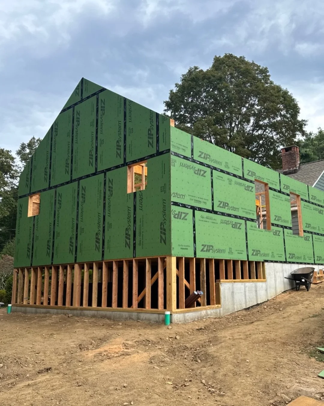 Custom addition in Redding, CT. Using @huberwood zip system gives us a dried-in shell so the subcontractors can start working and get the project rolling. #carpentry #framing #addition