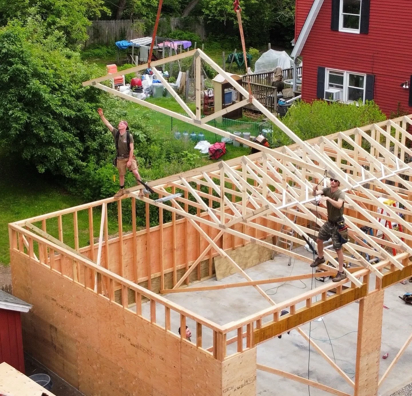 Throwback to warmer weather and installing a truss roof on a garage in Newtown, CT. Layout verified, plates aligned and ready for a roof.