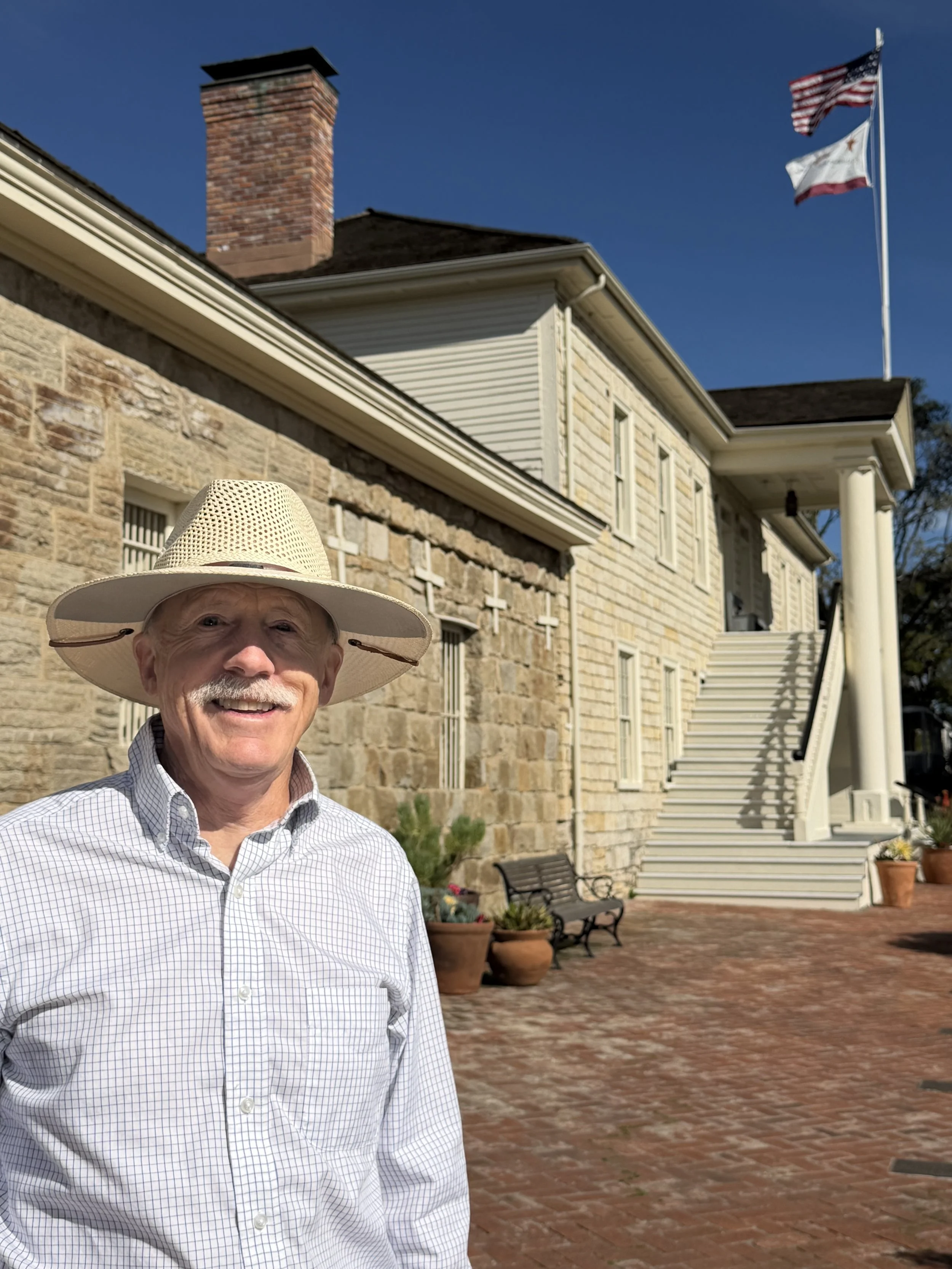 Candidate Tom Reeves in front of Colton Hall in Monterey.