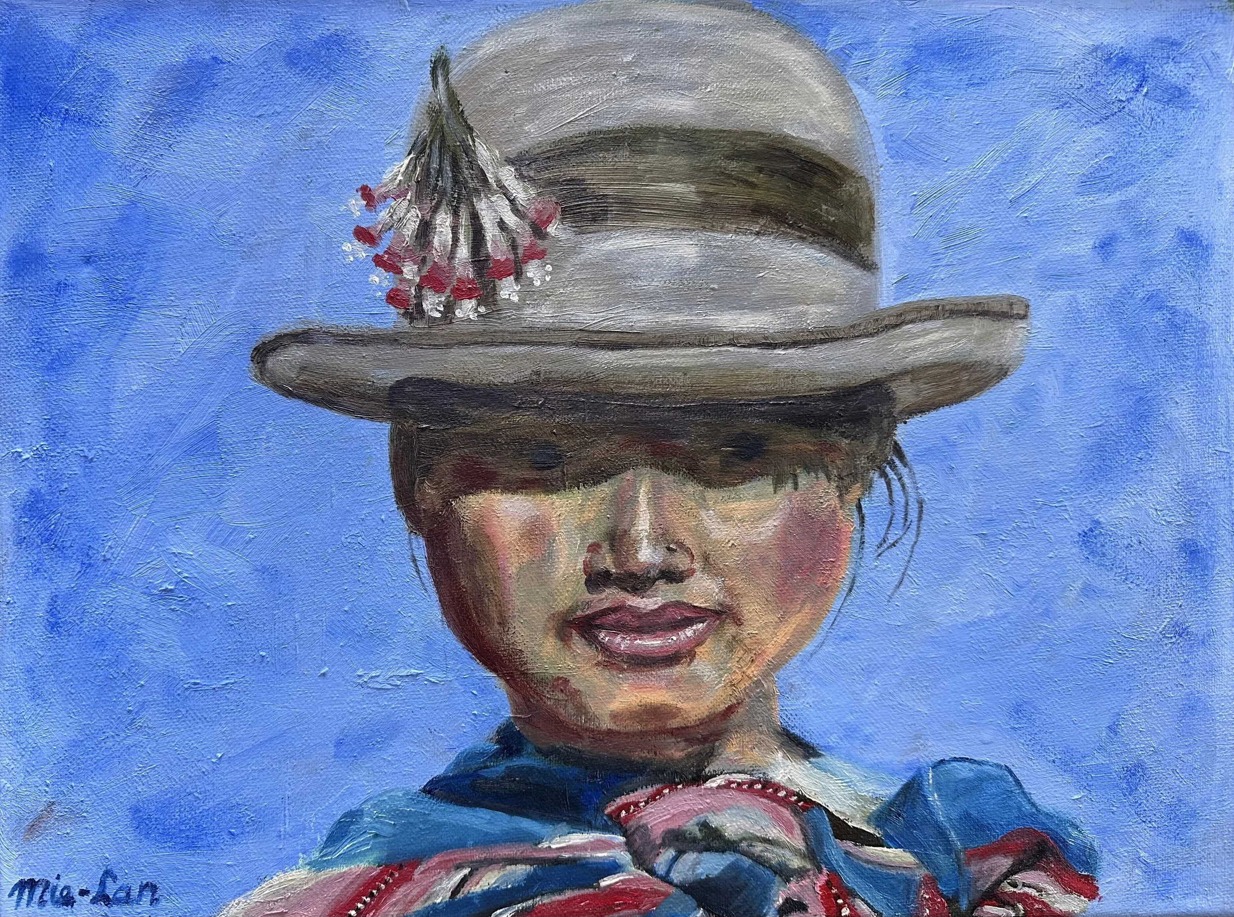 NAME: Peruvian Girl II
DESCRIPTION: This painting portrays a young Peruvian girl wearing a traditional hat. Wrapped in a colorful woven shawl, she radiates quiet confidence and cultural pride.
MATERIAL: Oil on Canvas 
DIMENSIONS: 30 CMX 40 CM 
PRICE: