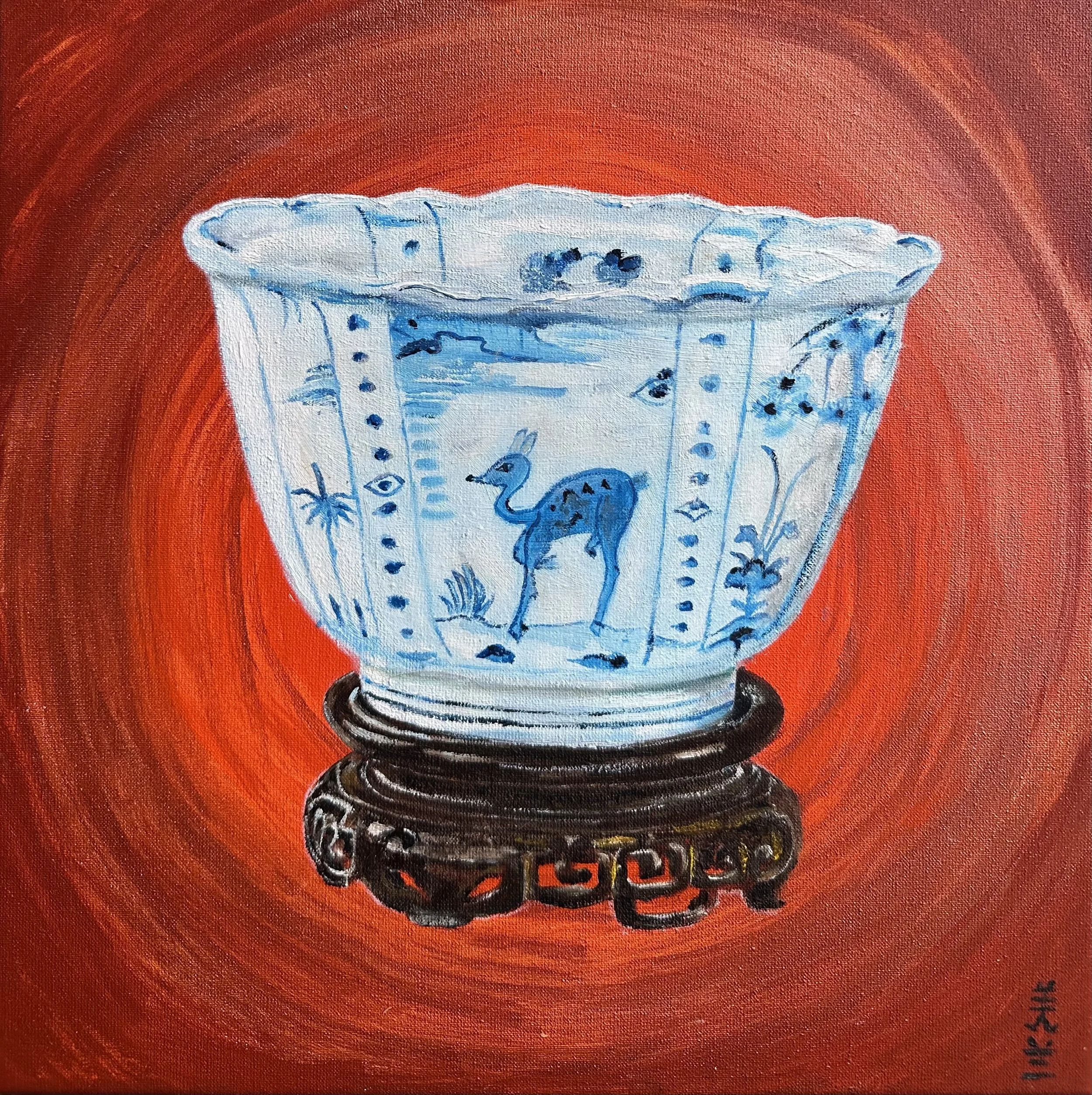 NAME: Wanli's Bowl DESCRIPTION: This painting depicts a blue-and-white Kraak porcelain bowl from the Wanli period, one of the most iconic and beloved styles of Chinese ceramics. On this particular bowl, a delicate deer is painted at the center, surro