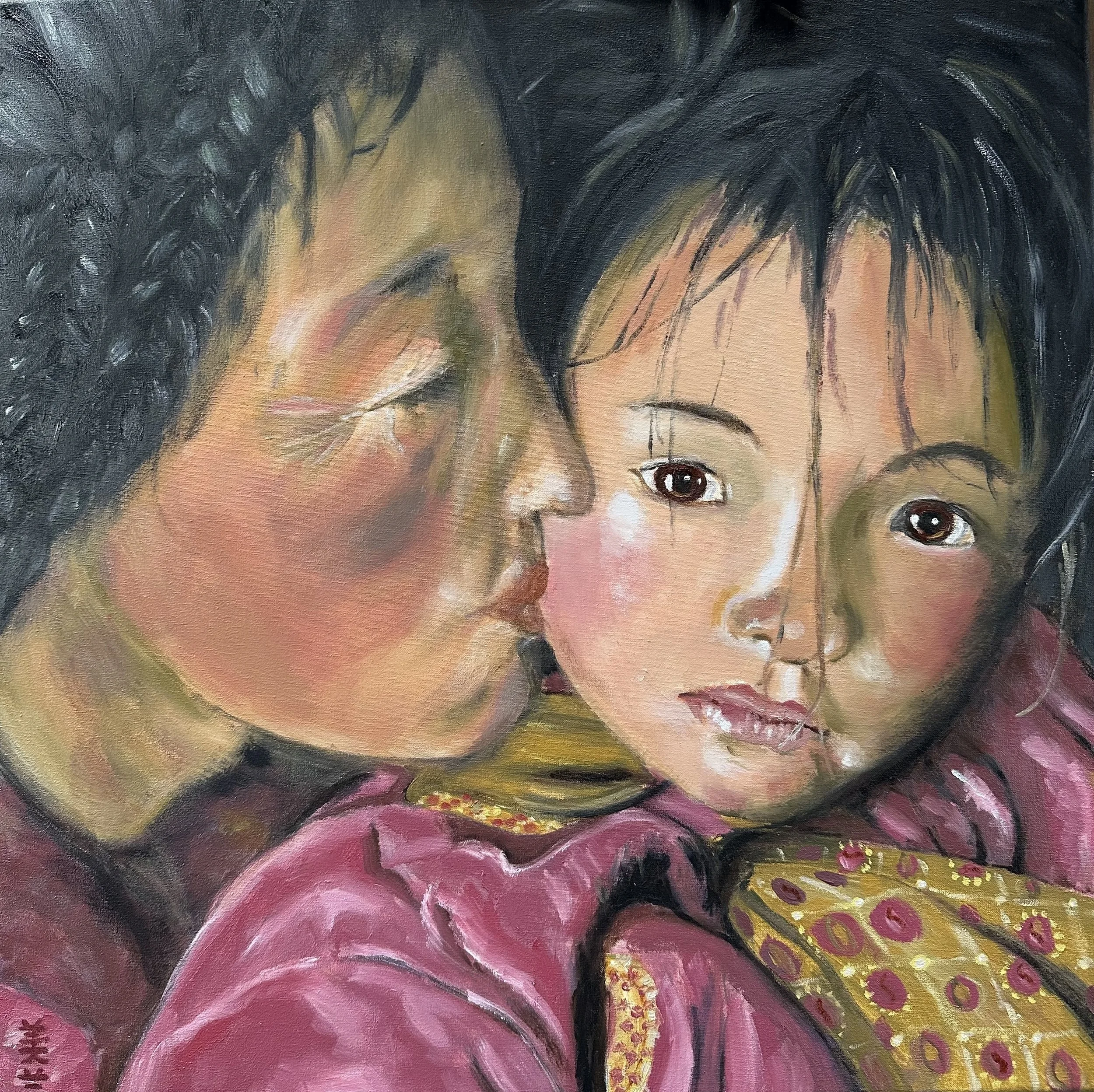 NAME: Tibetan Mother with Child
DESCRIPTION: The painting portrays a Tibetan mother and child dressed in traditional clothing. The child gazes dreamily at the viewer, while the mother lovingly kisses her little one. The color palette is subdued, emph