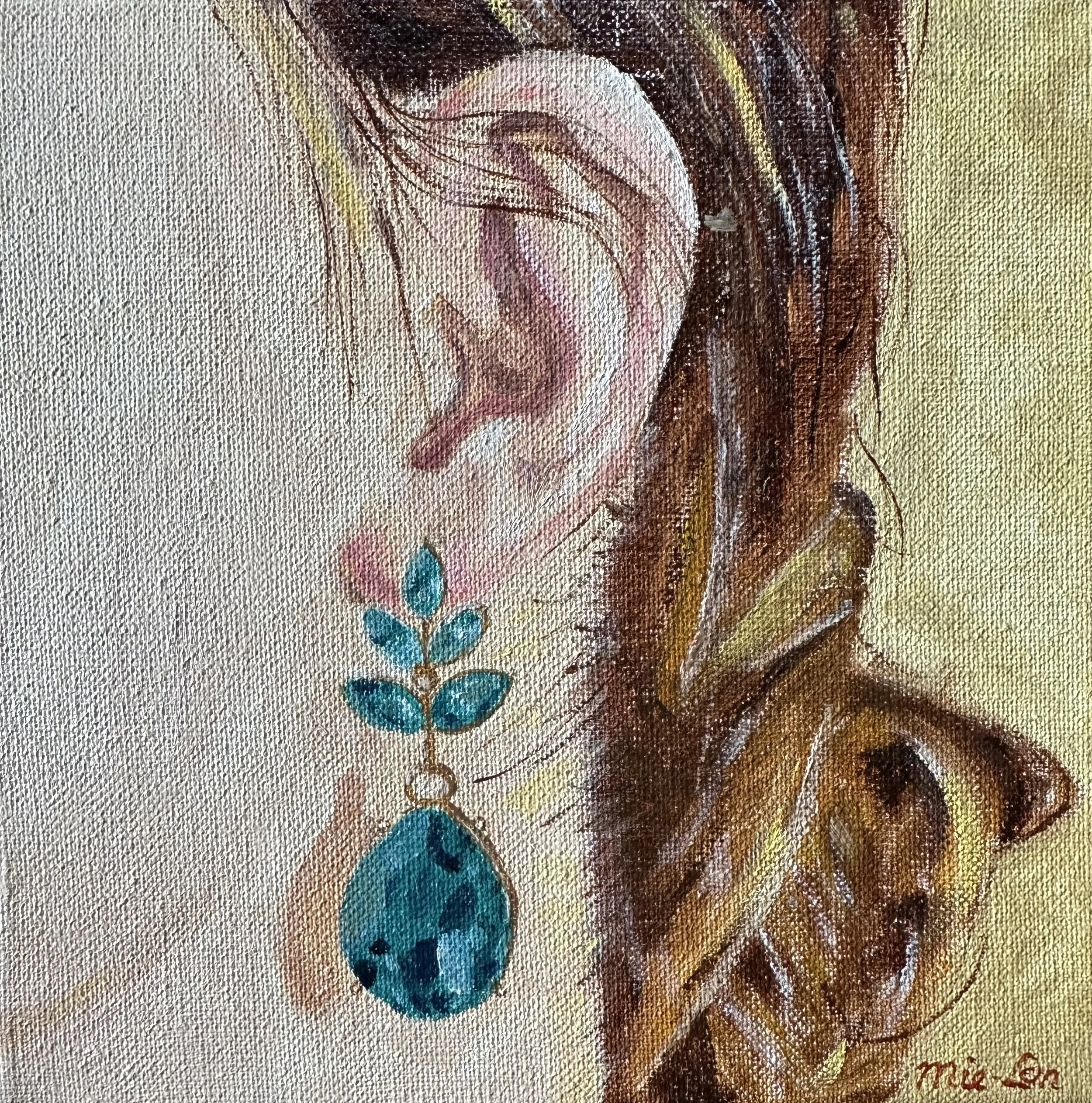 NAME: Ear
DESCRIPTION: A delicate close-up of an ear adorned with a striking emerald earring, this small painting draws the viewer's attention to the subtle elegance of the subject. With her hair swept up, the ear and earring are framed in such a way