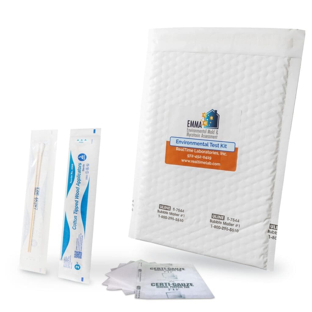Environmental test kit for mold and mycotoxins, including a white padded envelope labeled "EMMA Environmental Mold & Mycotoxin Assessment," test strips, and sealed gauze pads.