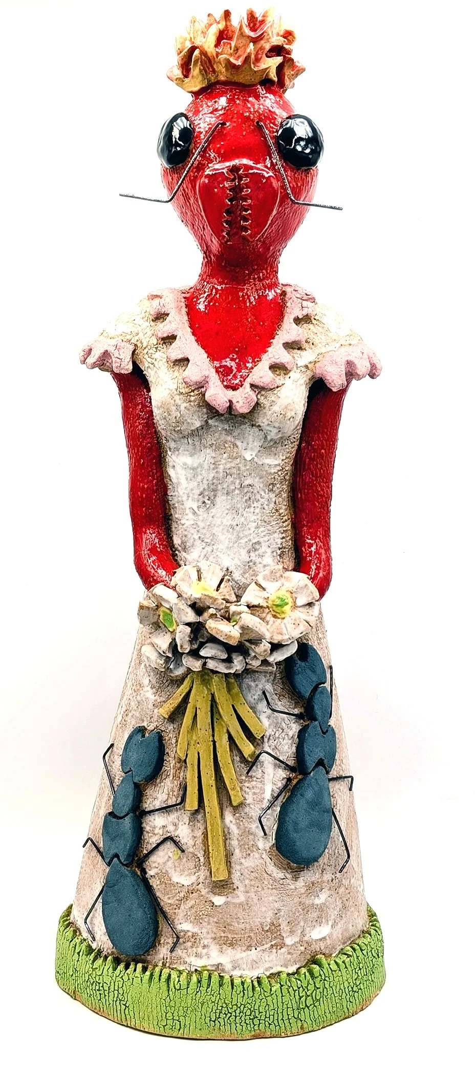Ceramic Fire Ant Princess holding a bouquet of fresh daisies.