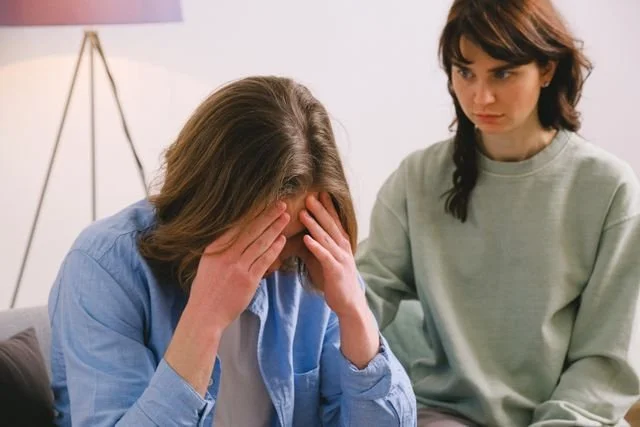 woman with upset friend