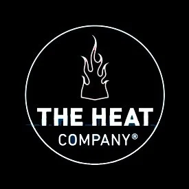 Logo of The Heat Company with a flame icon inside a circle on a black background.