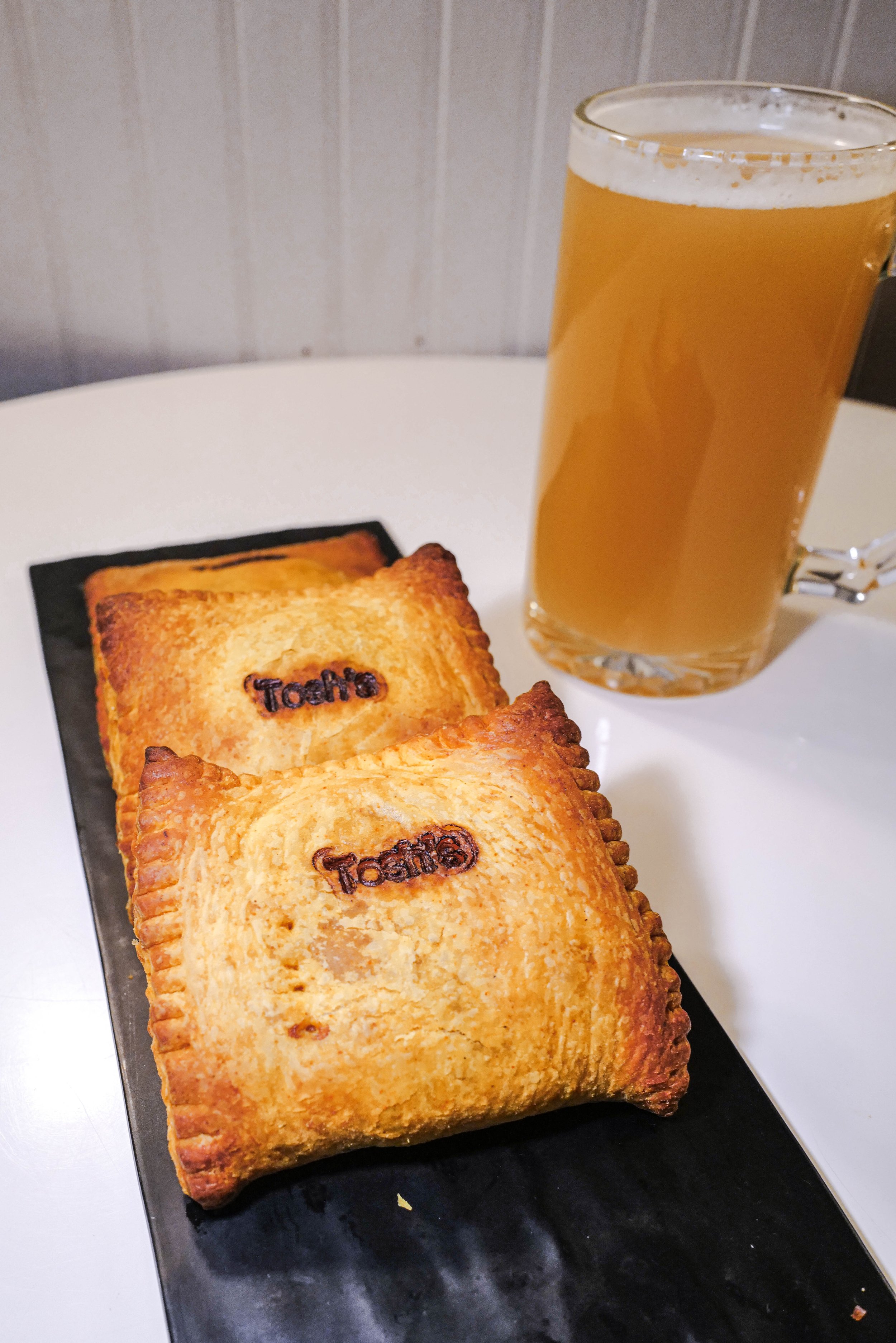 Two golden-brown pastries with 