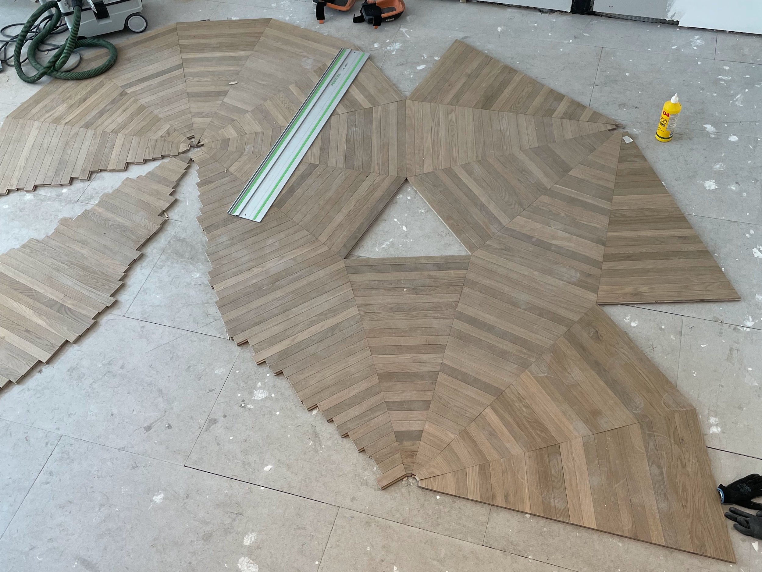 Dodecagon pattern engineered oak floor install. 
