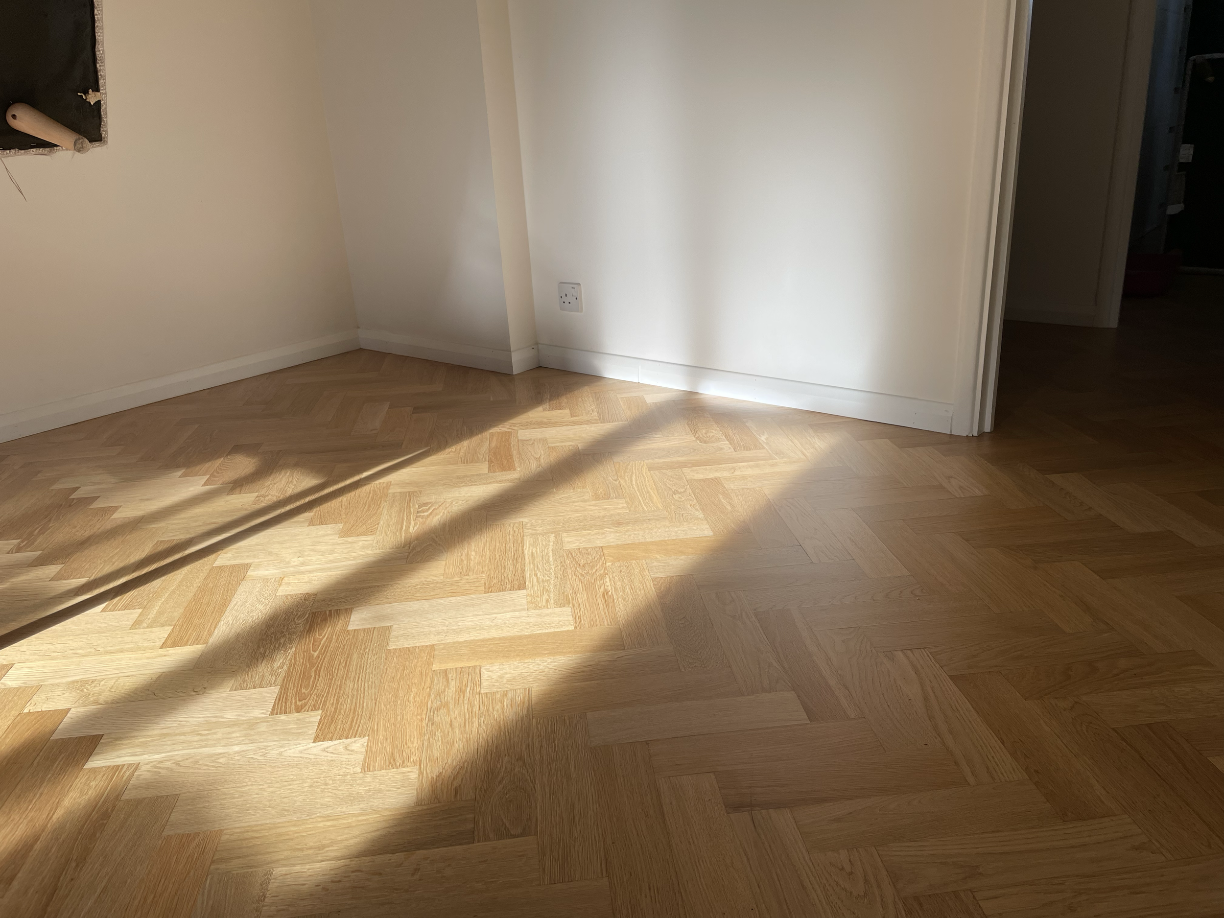 Solid oak parquetry with clear lacquer finish, Muswell Hill apartment. 