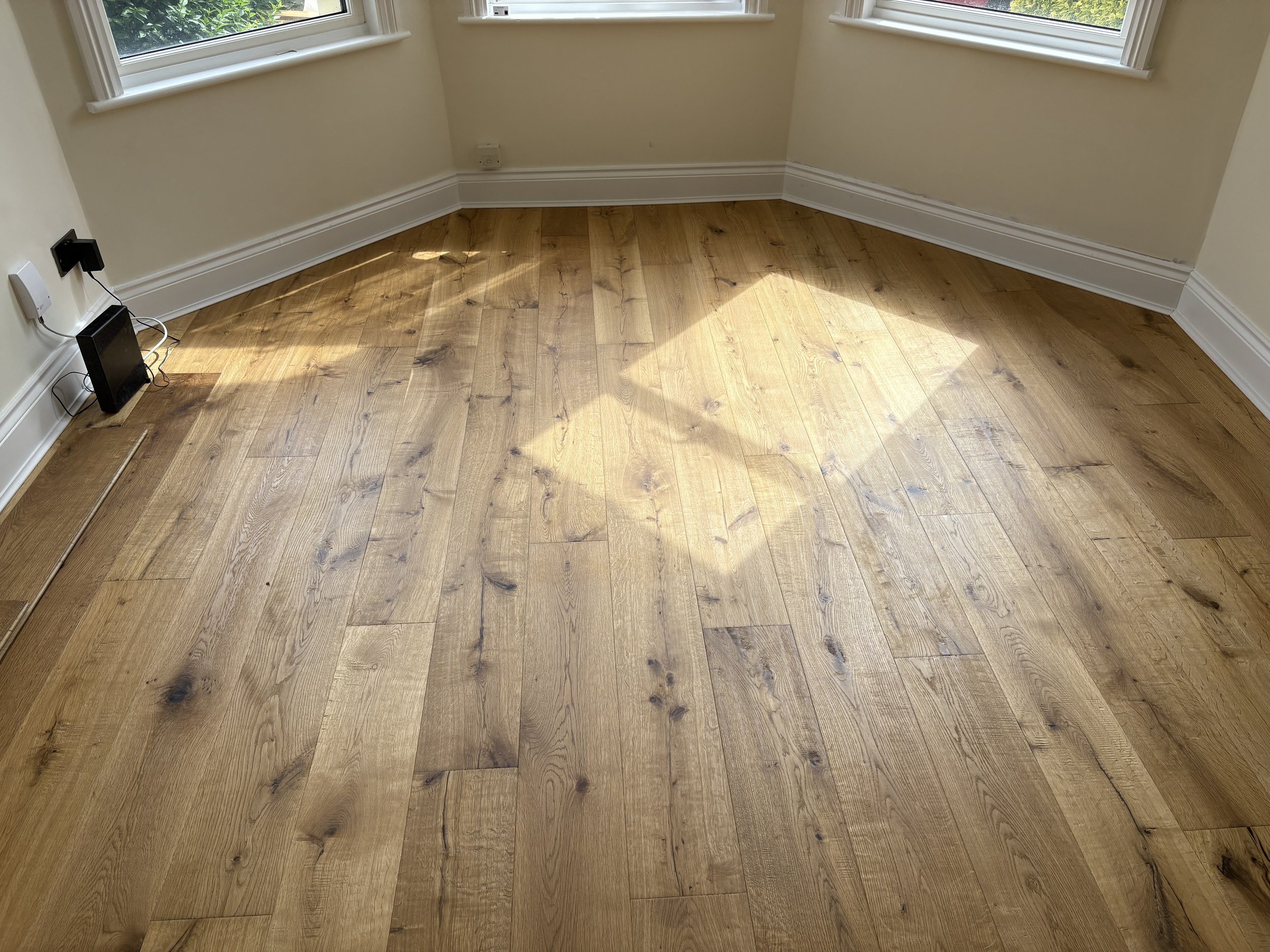 Engineered flooring planks. Green Lanes living room.


