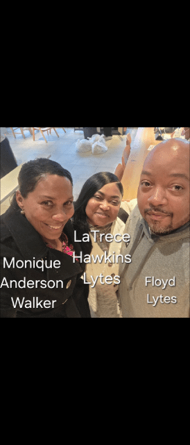 Group photo of four people smiling in an indoor setting, with names labeled: Monique Anderson, LaTrece Hawkins Lytes, Floyd Lytes, and an unidentified woman.