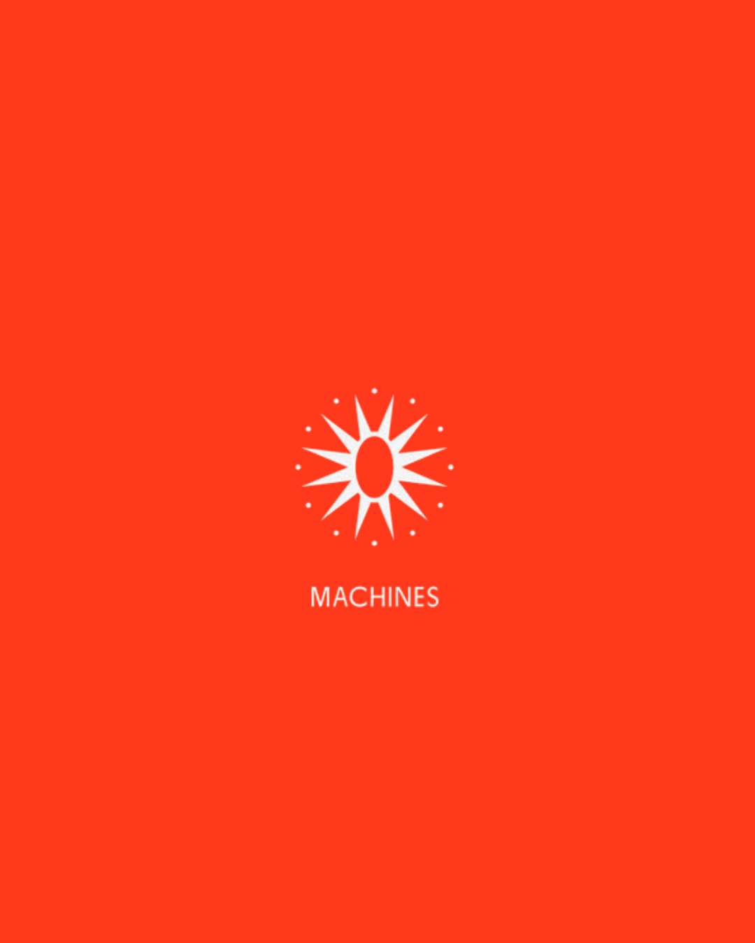 Red cover with a white starburst design in the center and the word 'MACHINES' below it.