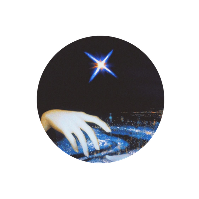 A hand reaching towards a glowing star in the night sky over a cityscape.