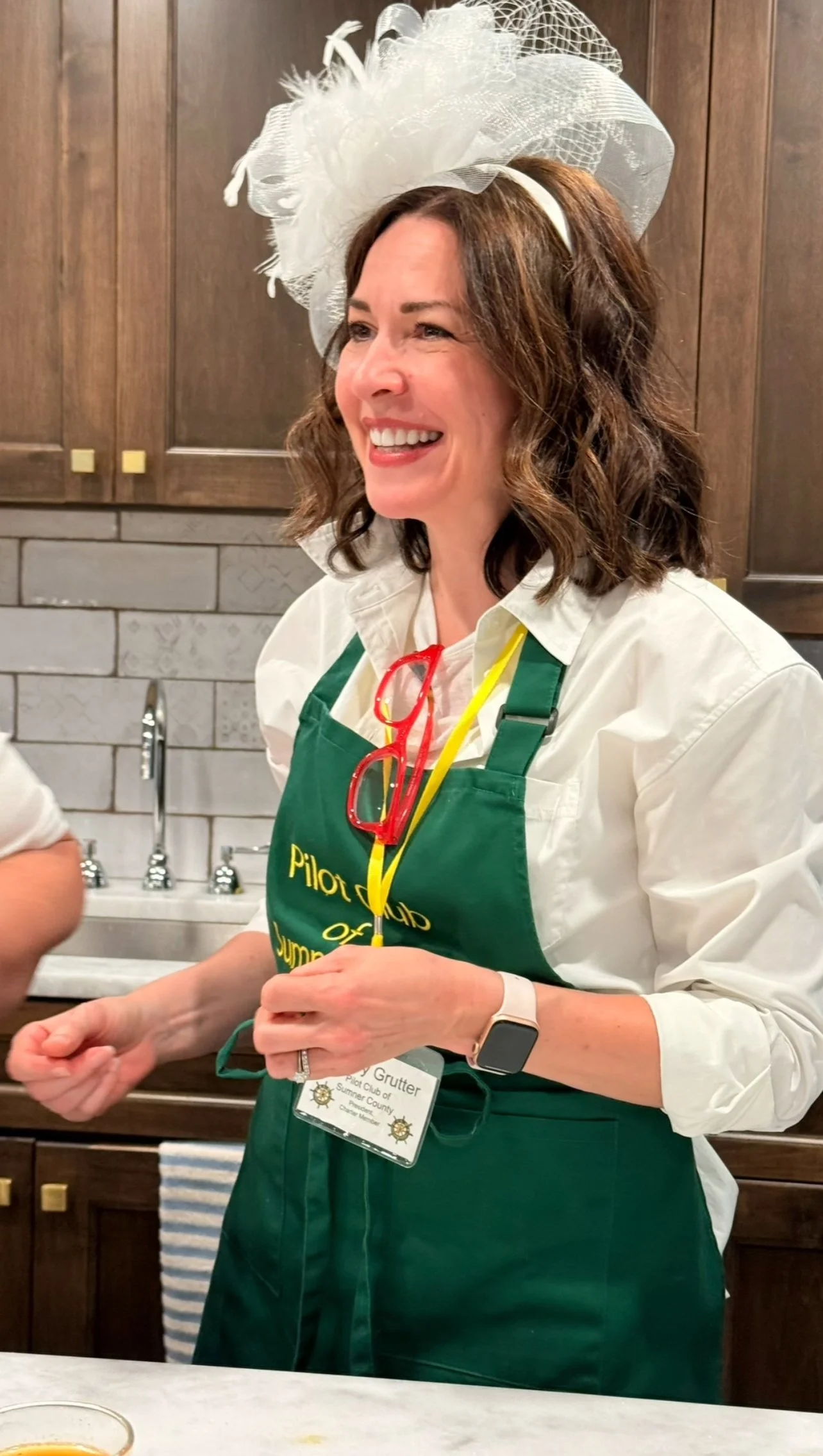Our President, Ashley Grutter, serving up our Spiced Tea at Legacy Village in Hendersonville!