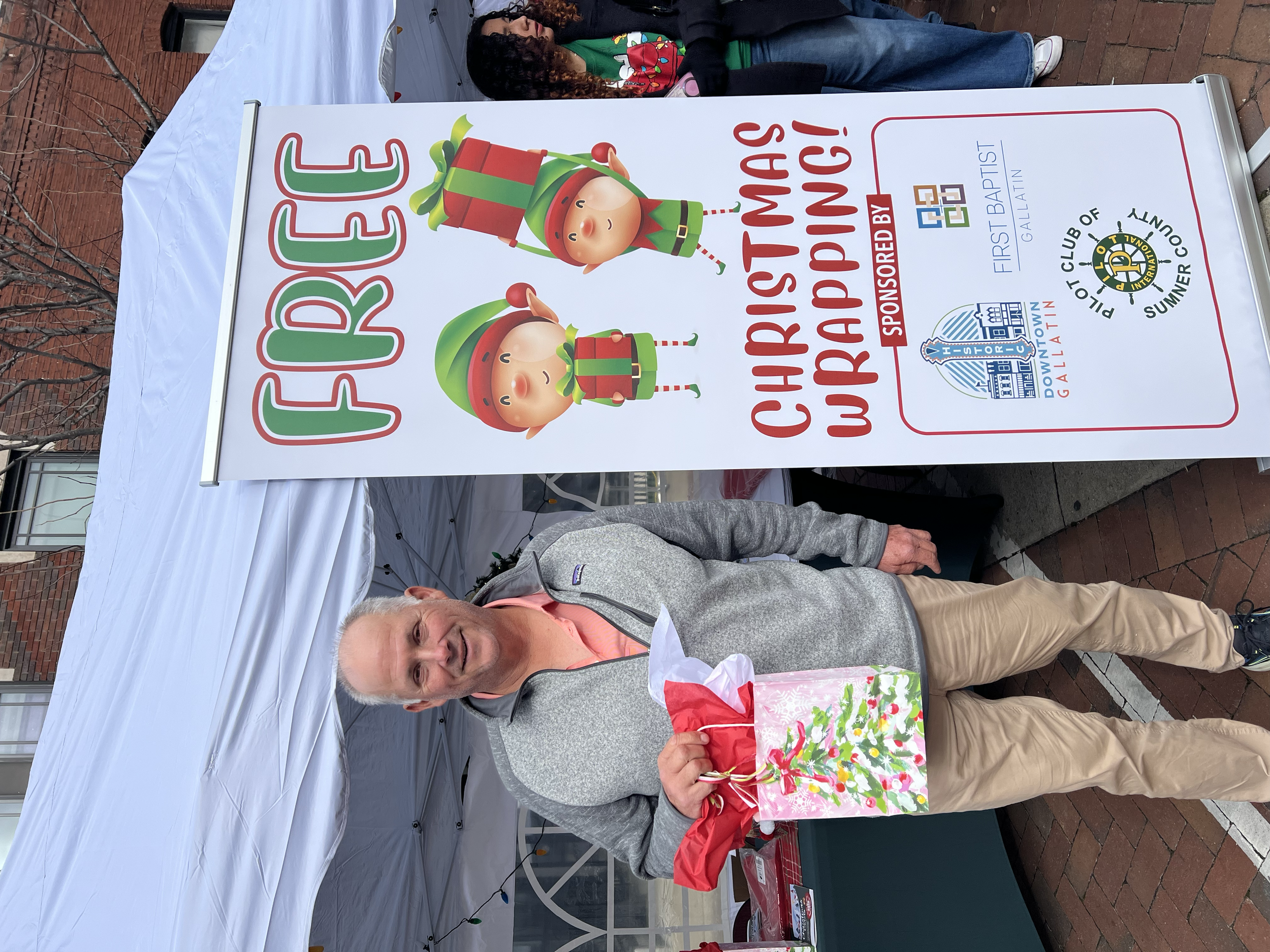 A very Merry shopper with a free gift bag!