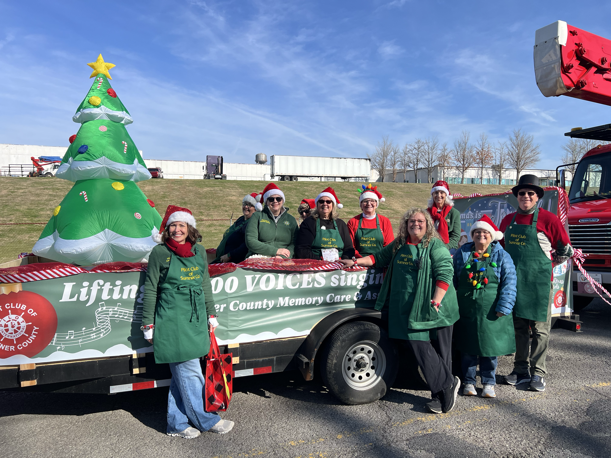 Distributing free Christmas Carol Booklets at the Gallatin Christmas Parade