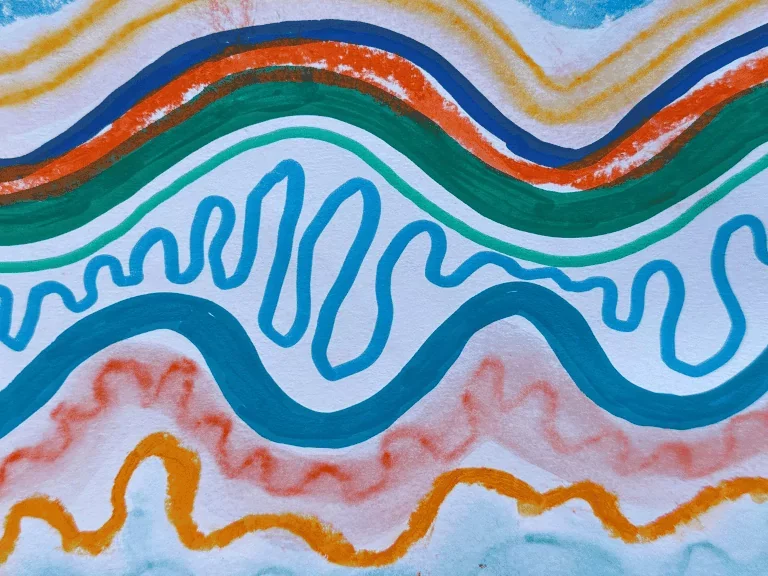Abstract colorful drawing with wavy lines in orange, blue, green, and purple.